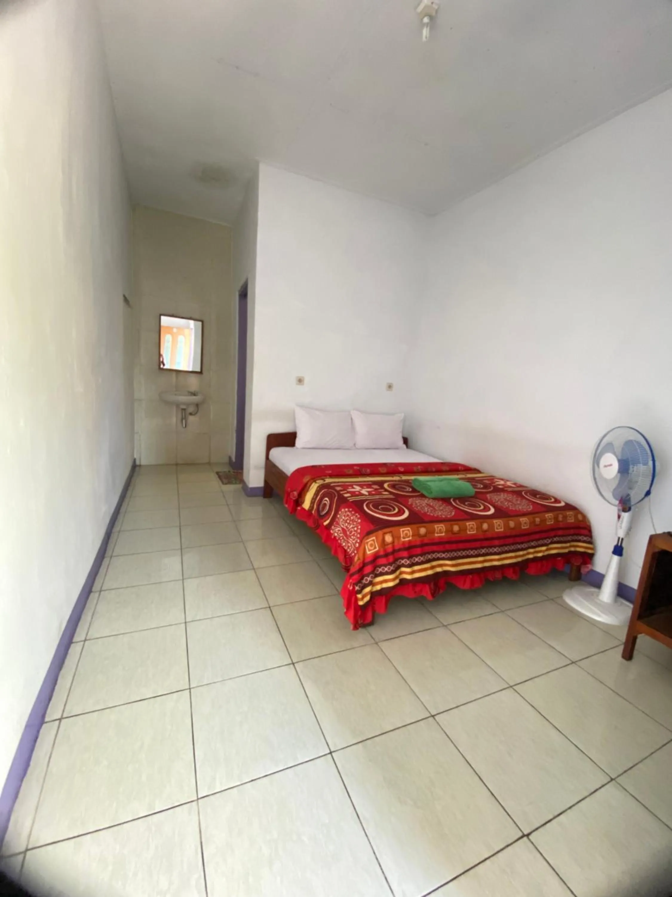 Bed in Mahoni Guest House