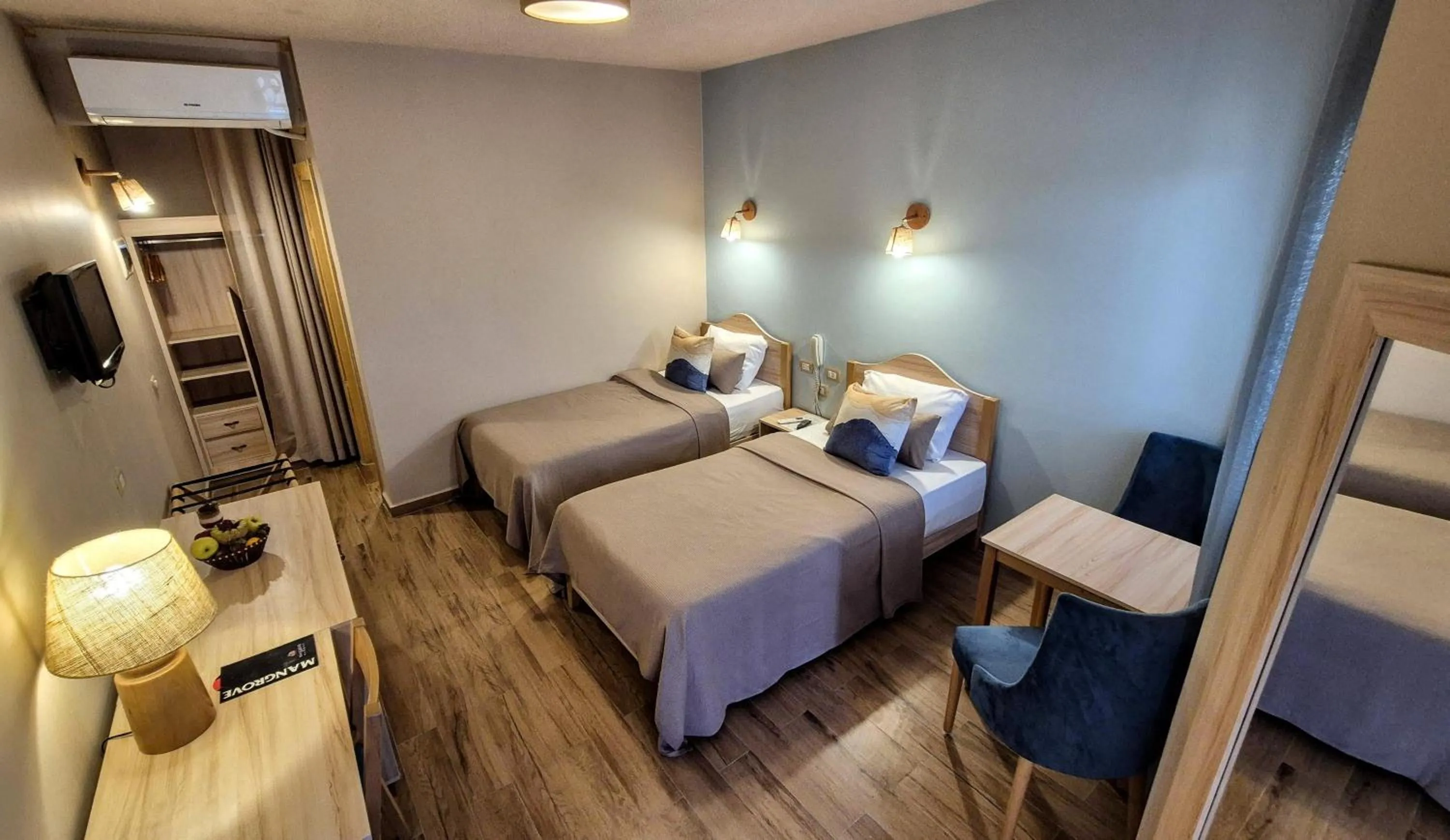 Bed in Mangrove Bay Resort