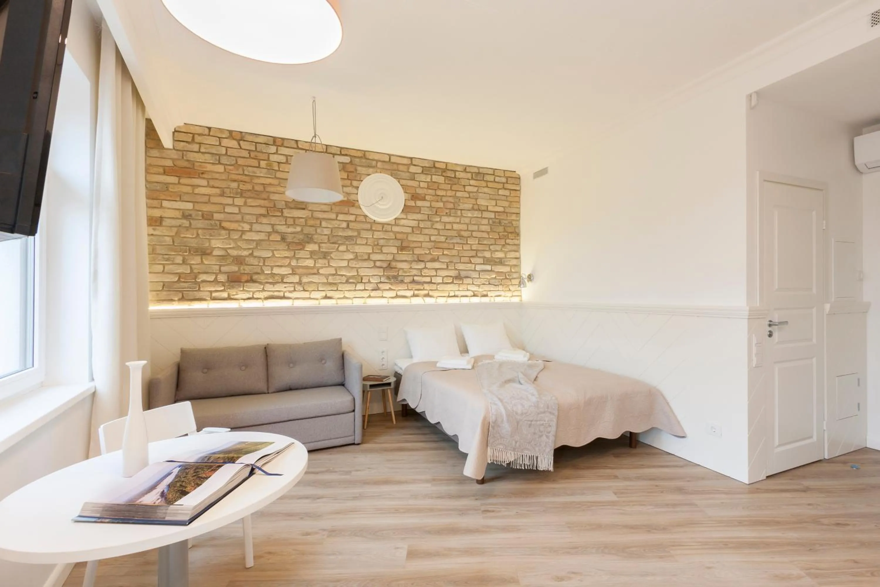 Studio with Balcony in 9010 Apartments