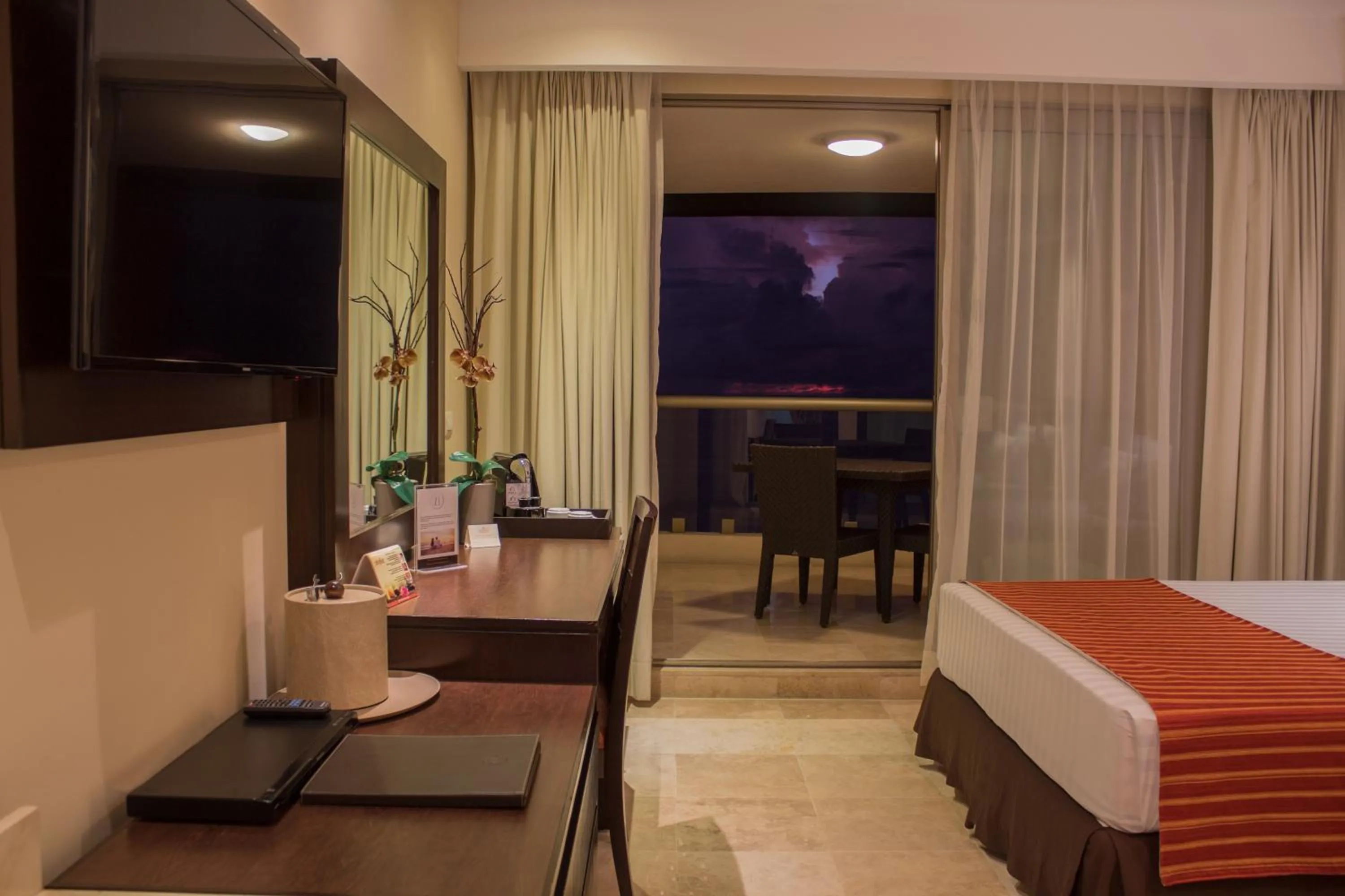 Toilet, Bed in Sunset Plaza Beach Resort Puerto Vallarta All Inclusive