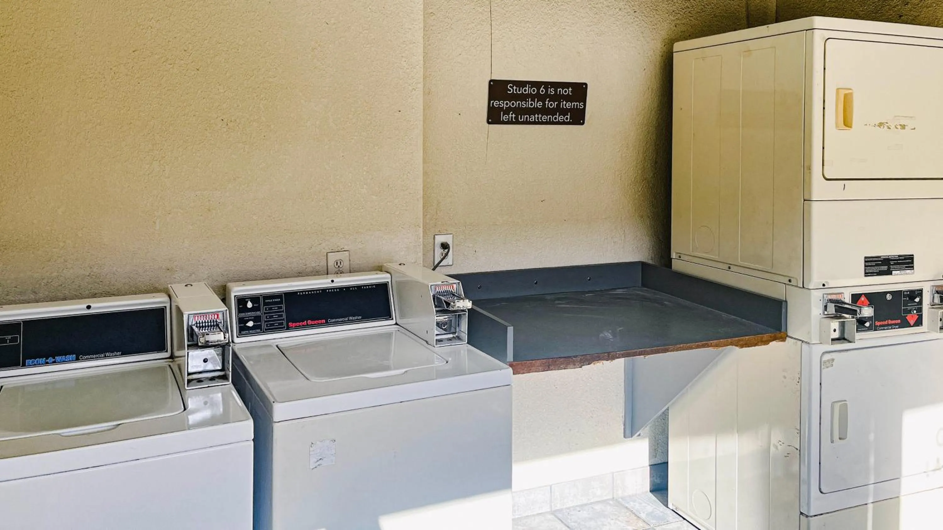 washing machine in Studio 6 Suites Dallas TX - Loop 12 West