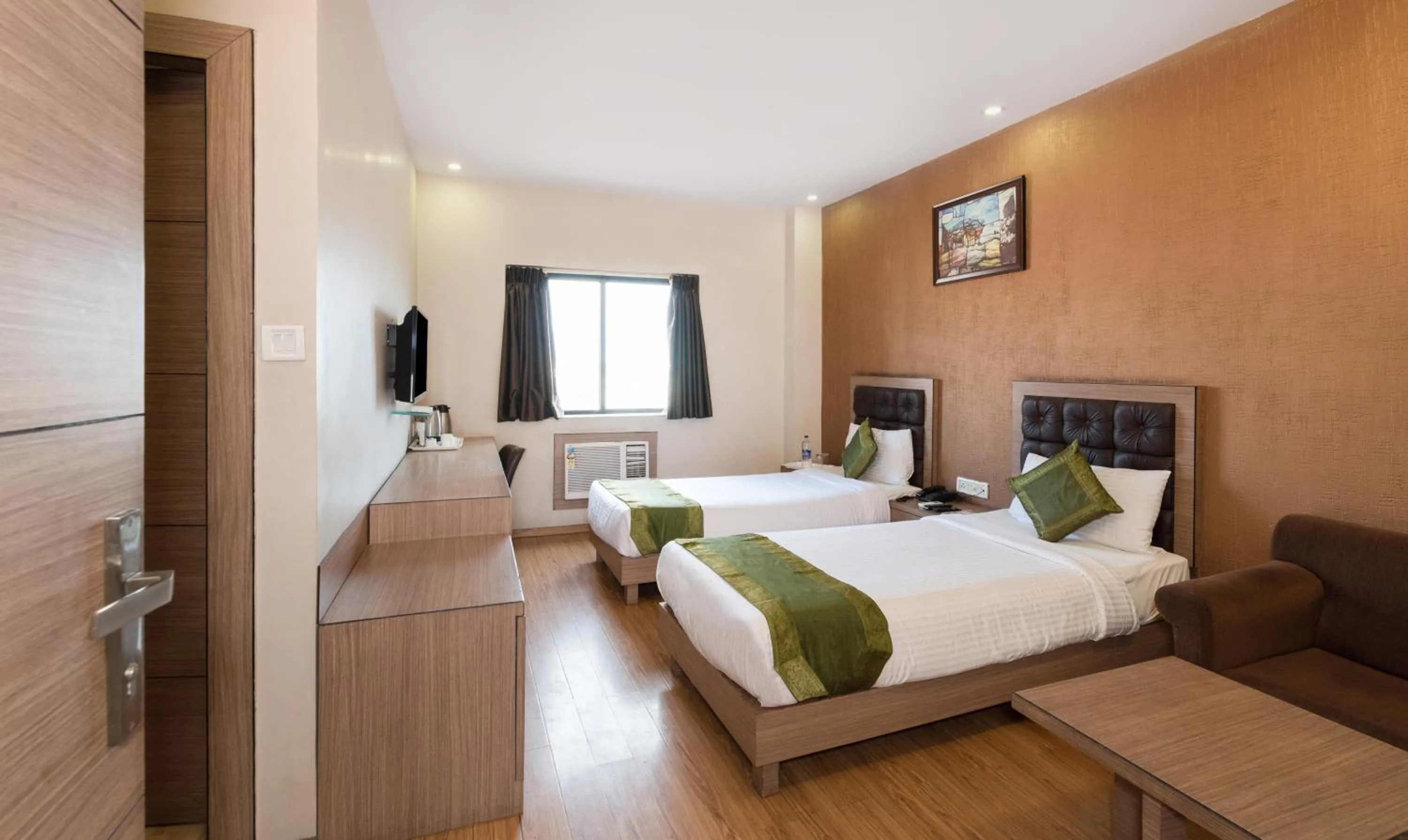 Bedroom in Treebo Pal Comfort