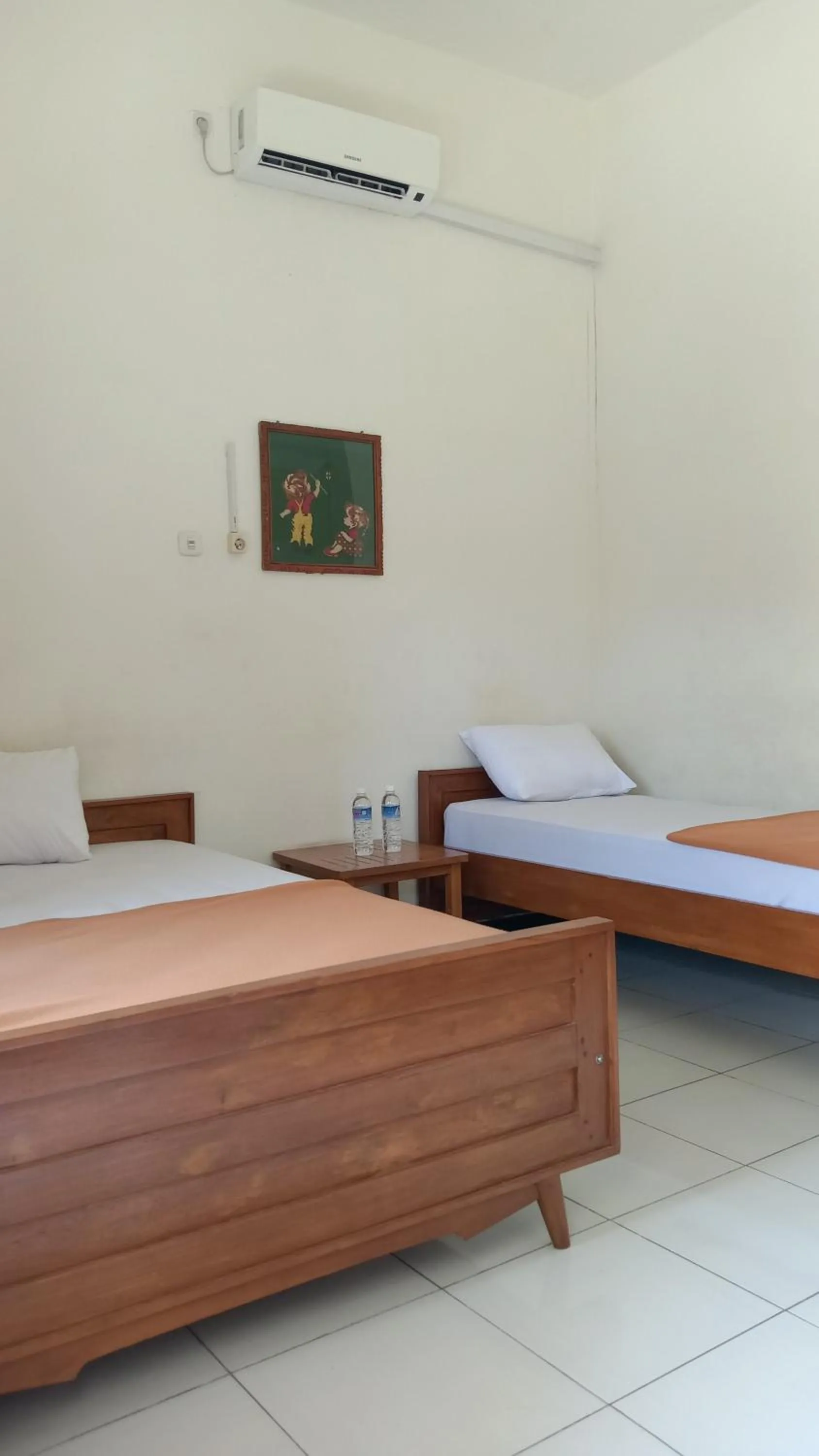 Bed in Hotel Tentrem Syariah