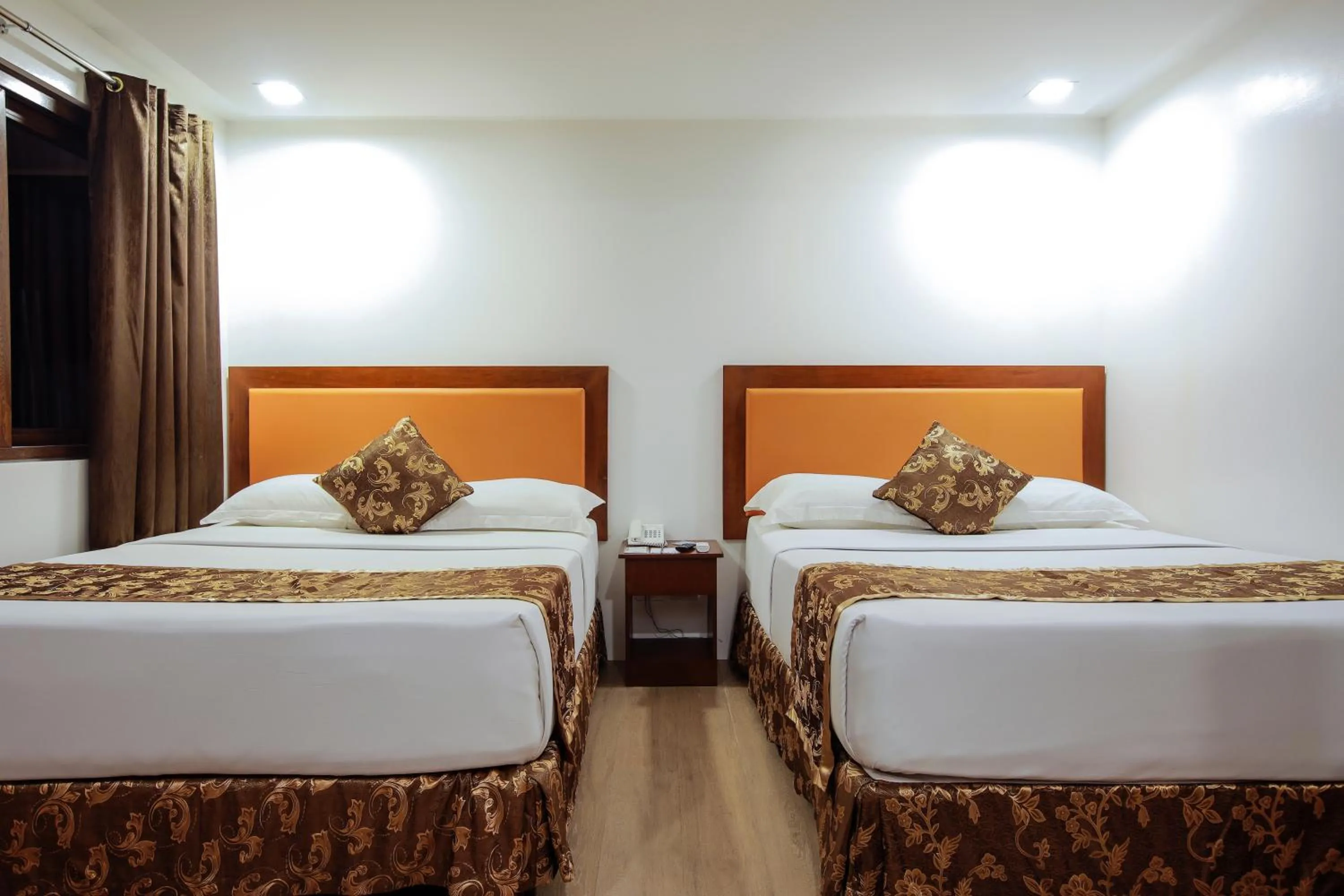 Photo of the whole room, Bed in Paradise Garden Hotel and Convention Center Boracay Powered by ASTON