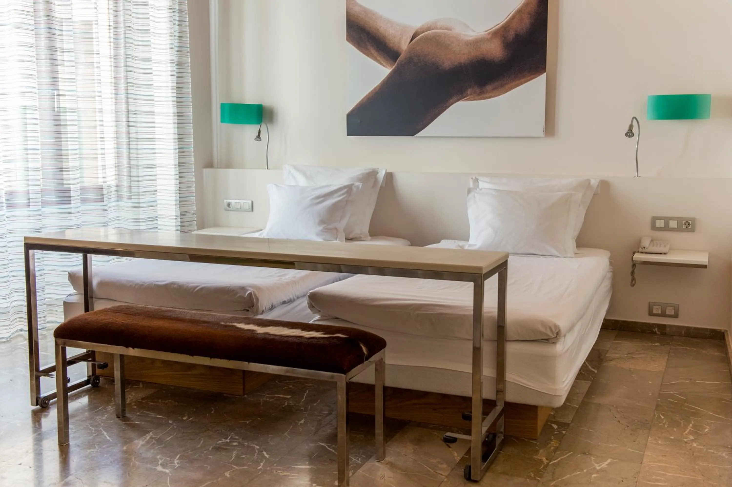 Bed in Petit Palace Hotel Tres