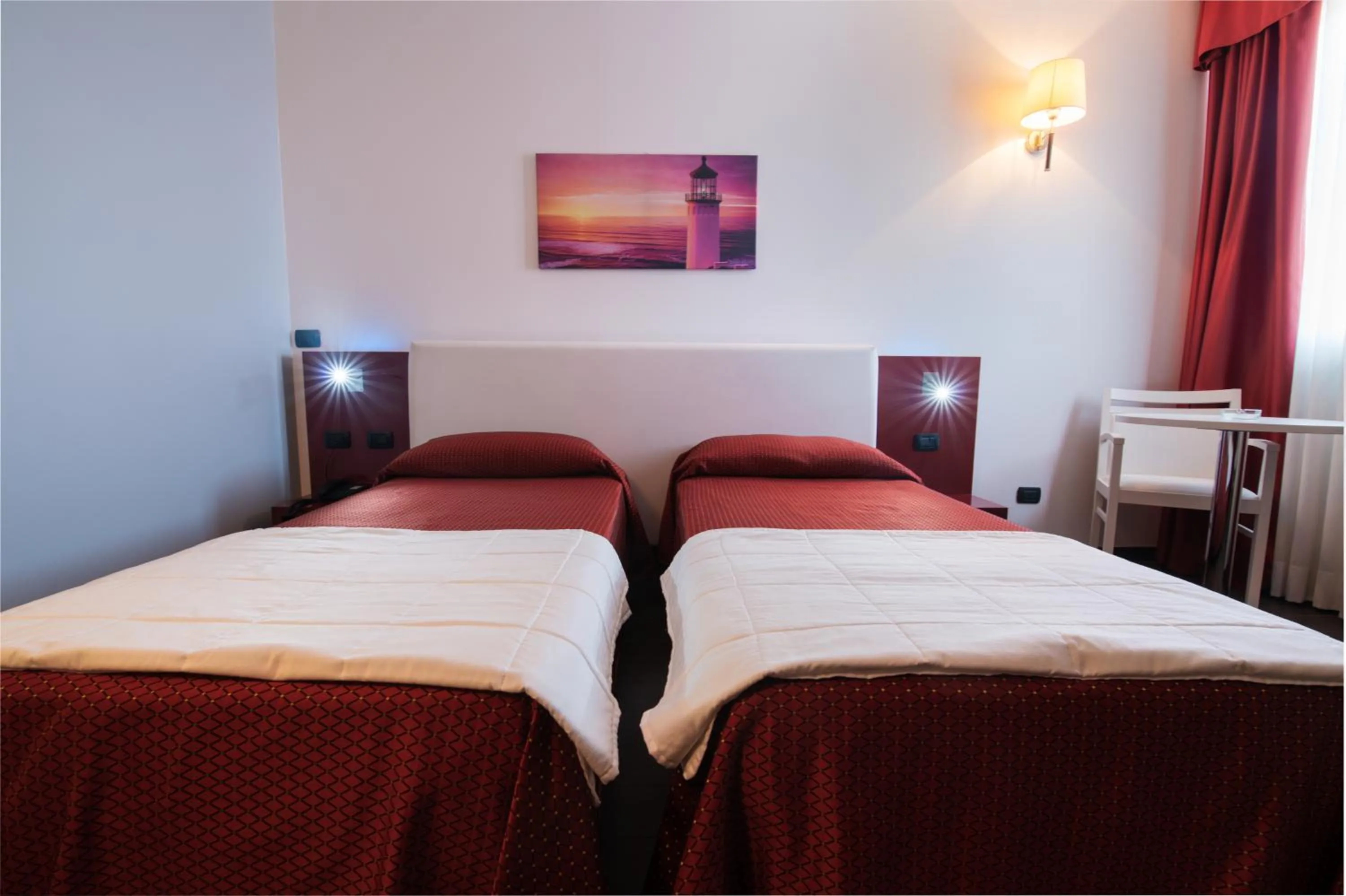 Bed in Hotel Mediterraneo