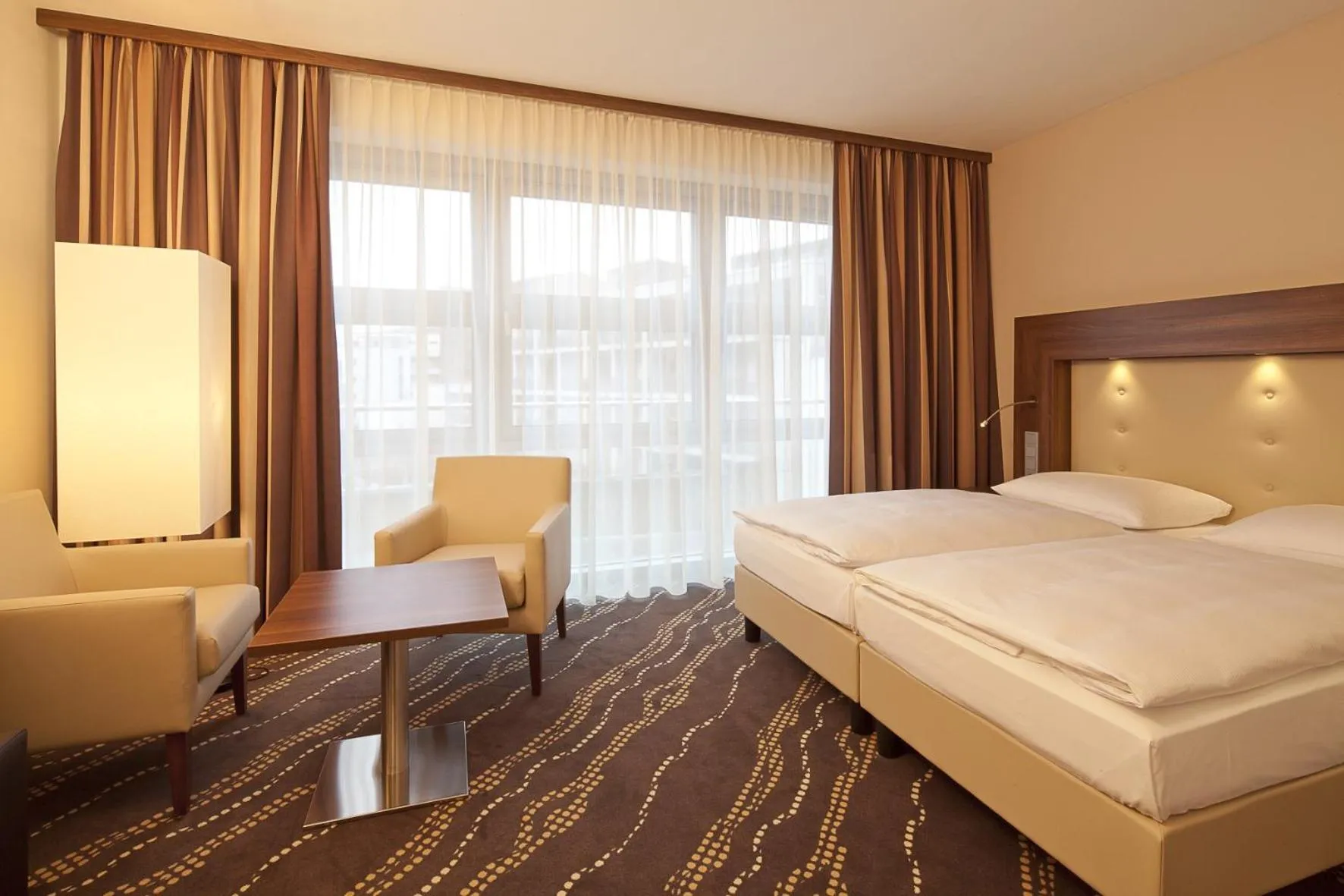 Photo of the whole room, Bed in Heikotel - Hotel Am Stadtpark