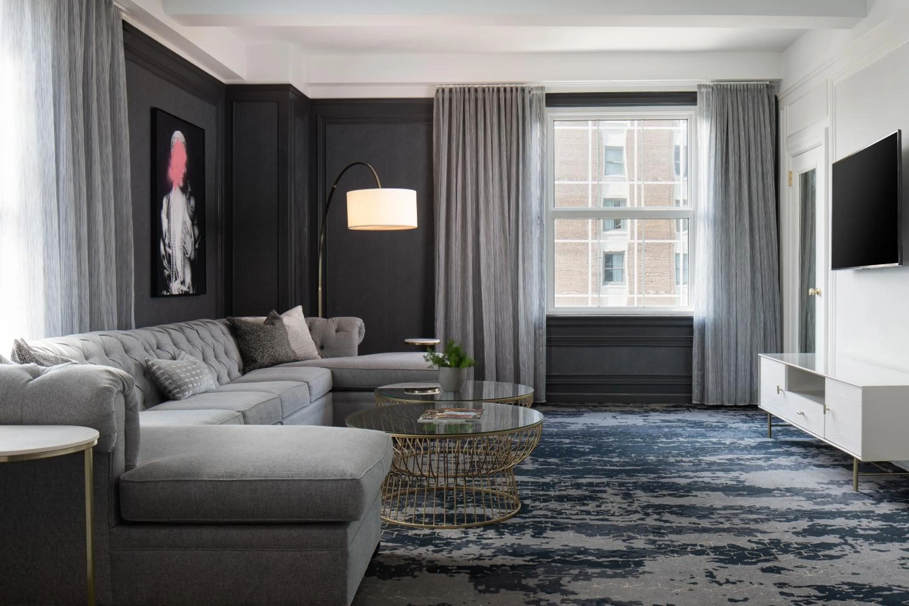 Living room in Amway Grand Plaza Hotel, Curio Collection by Hilton