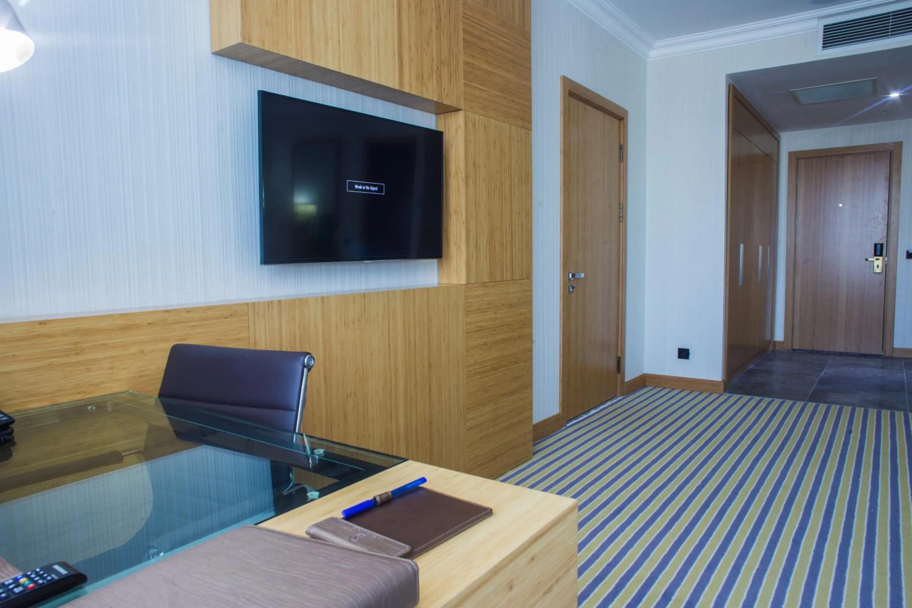 Bed in Aidana Plaza Hotel