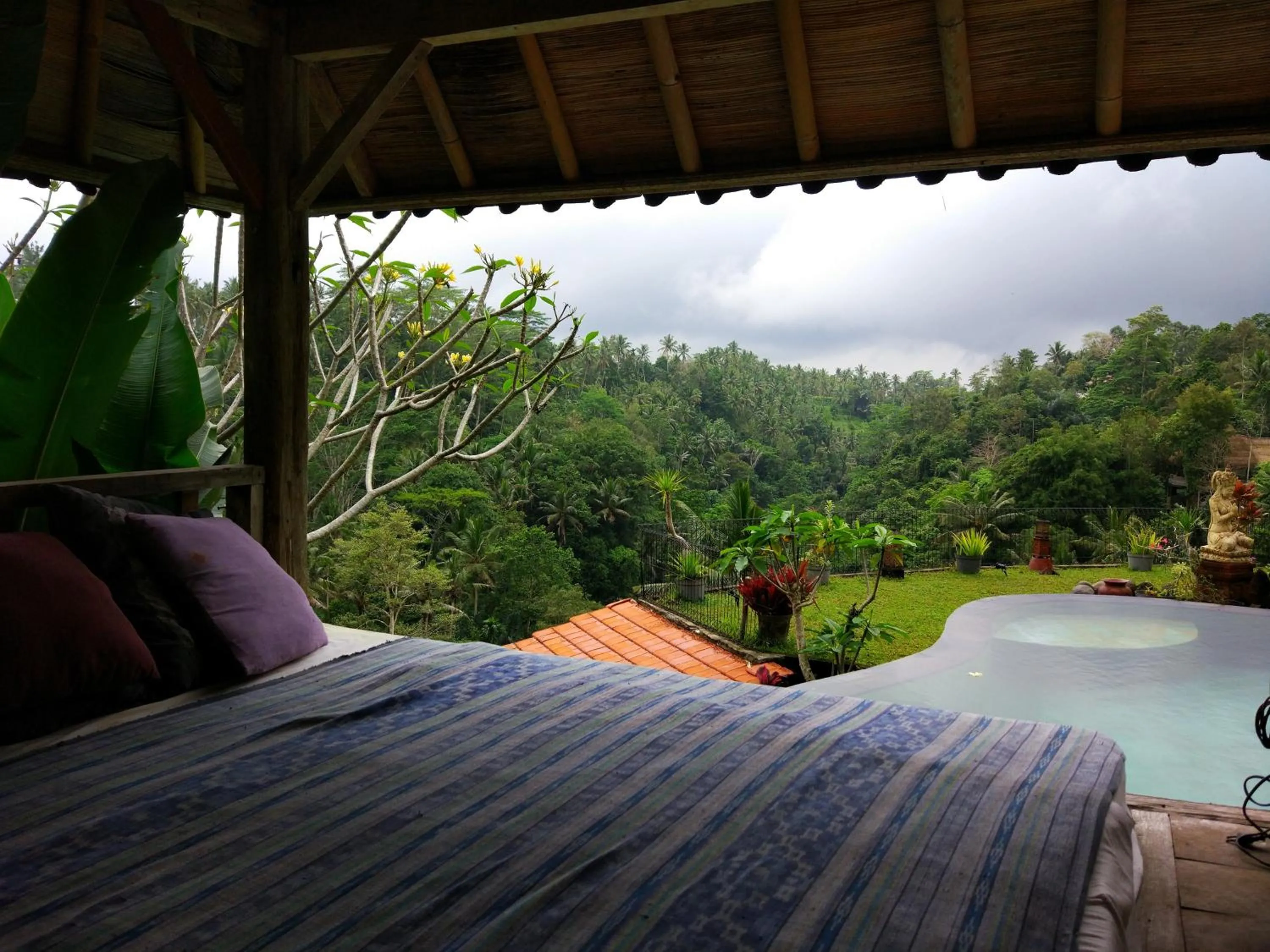 Bed in Tirta Asri Ubud Villa