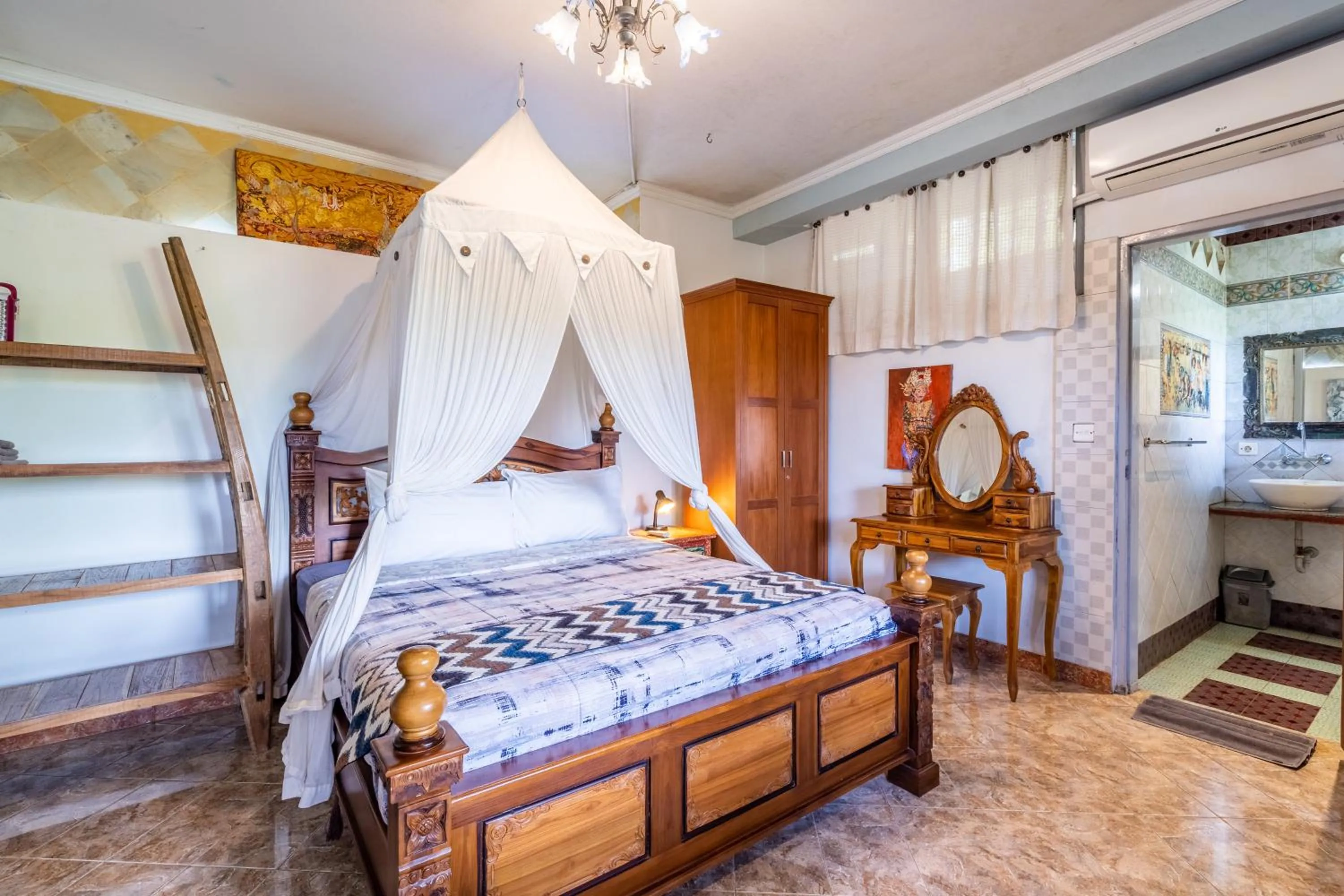 Bed in Tirta Asri Ubud Villa