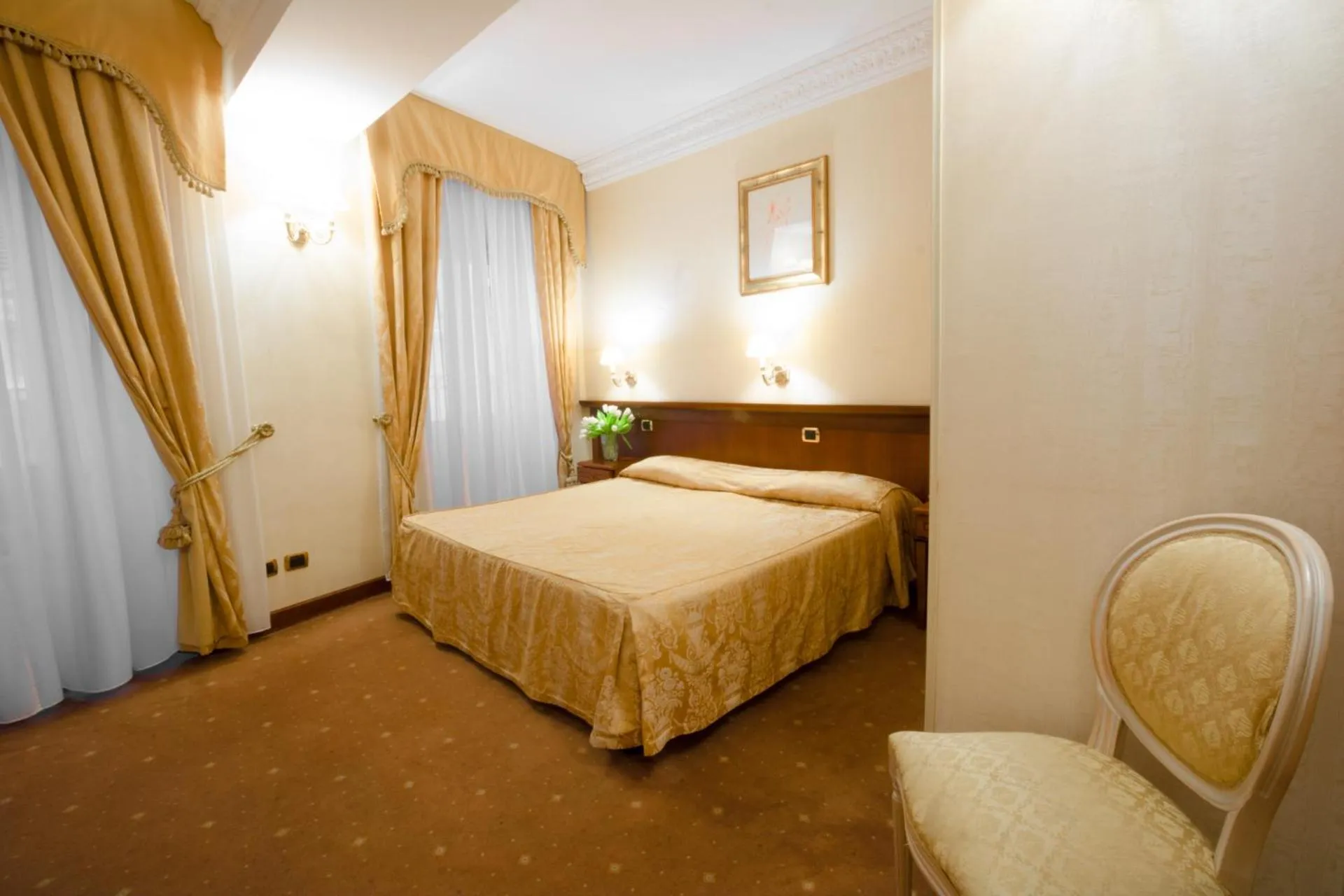 Photo of the whole room, Bed in Hosianum Palace