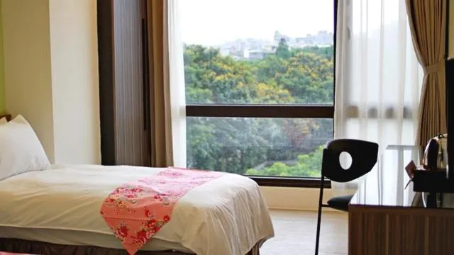 Bed in Sendale Zhubei Business Hotel