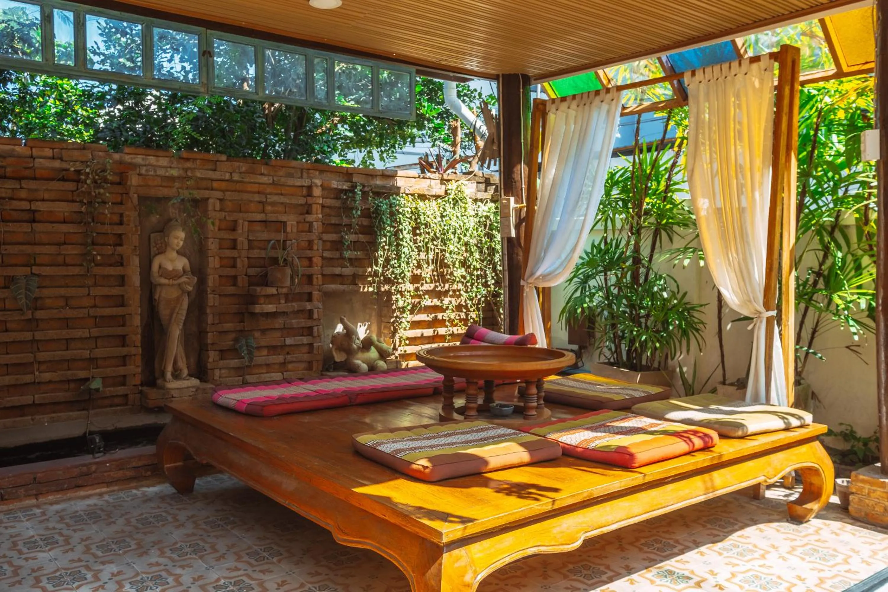 Seating area in Pao Come Boutique House