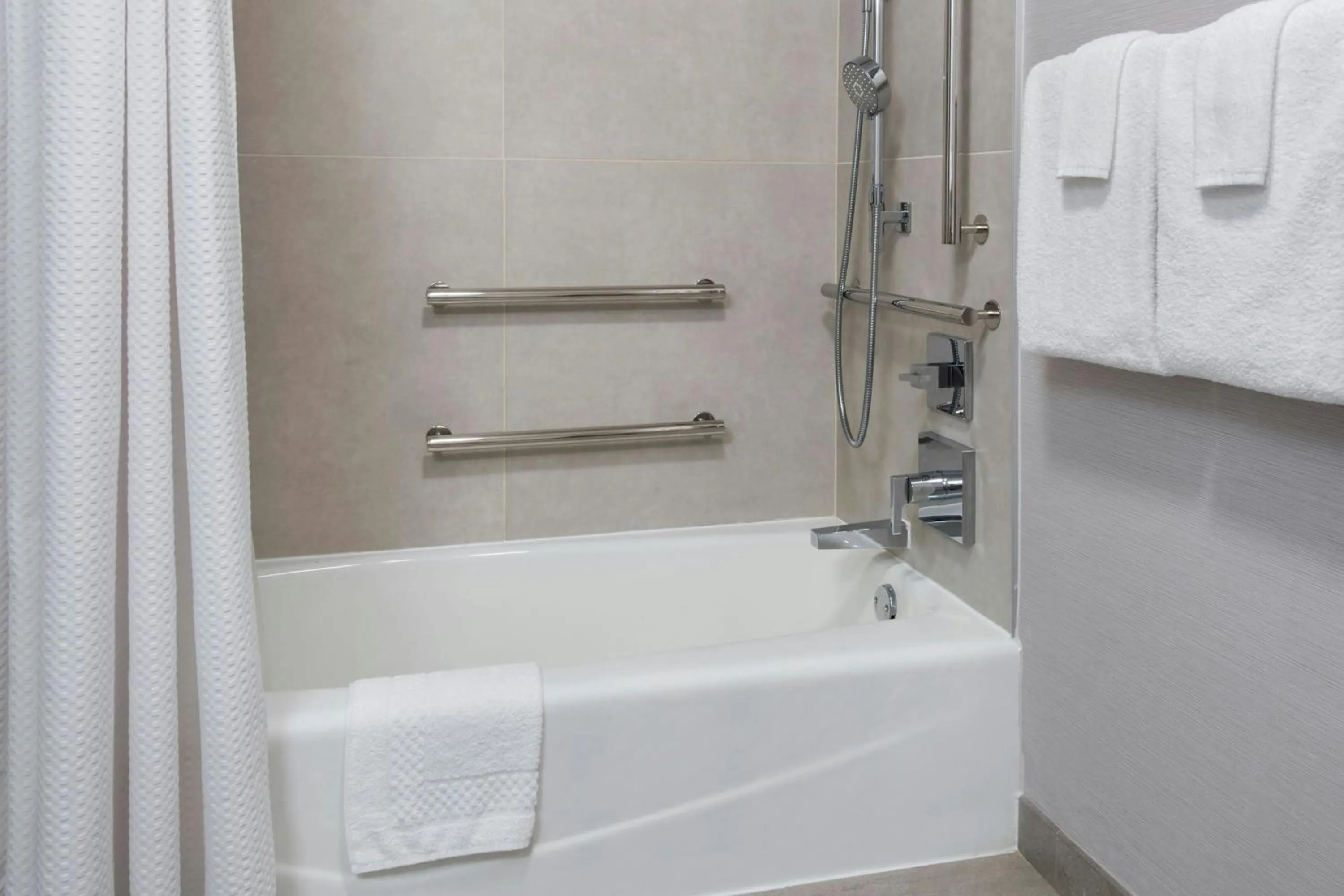 Bathroom in Courtyard By Marriott Jersey City Newport