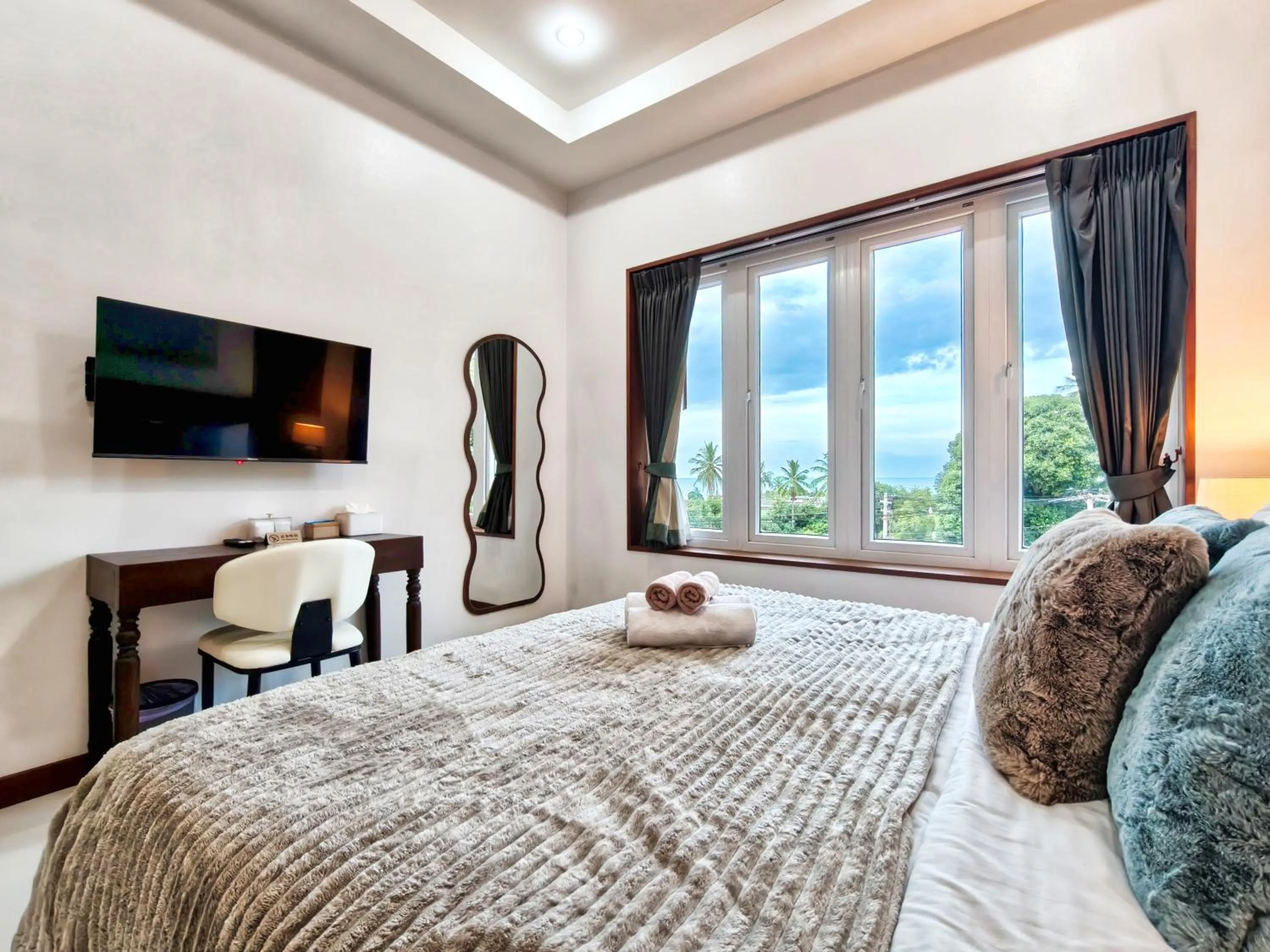 Bed in Surisa Seaview Pool Villas