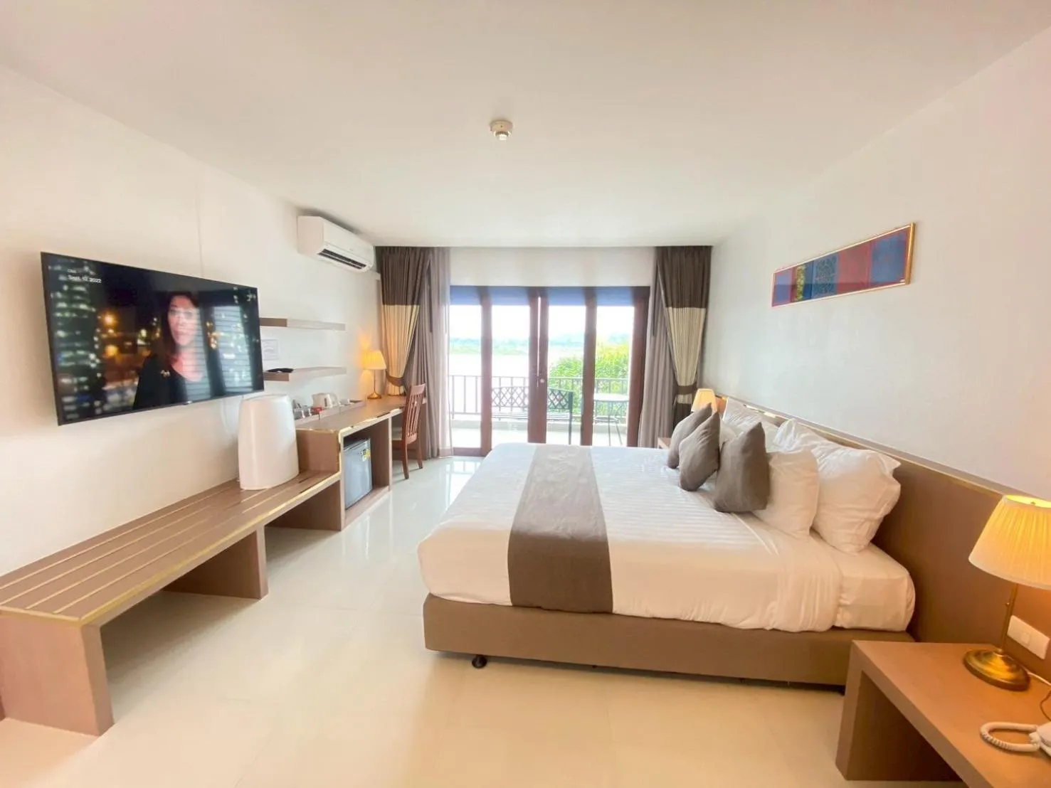 Bed in Siam Triangle Hotel Chiang Sean