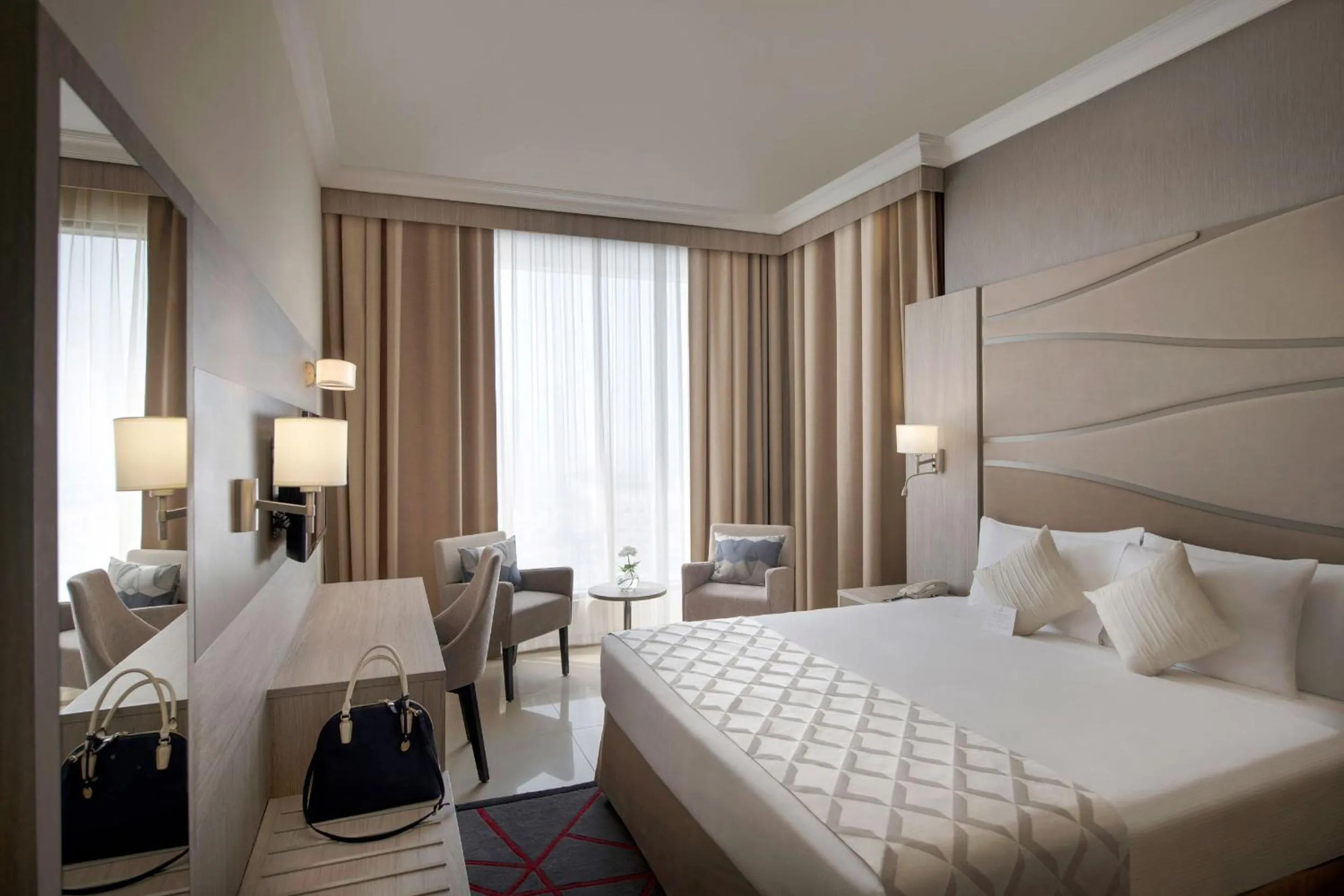 Bed in Two Seasons Hotel & Apartments