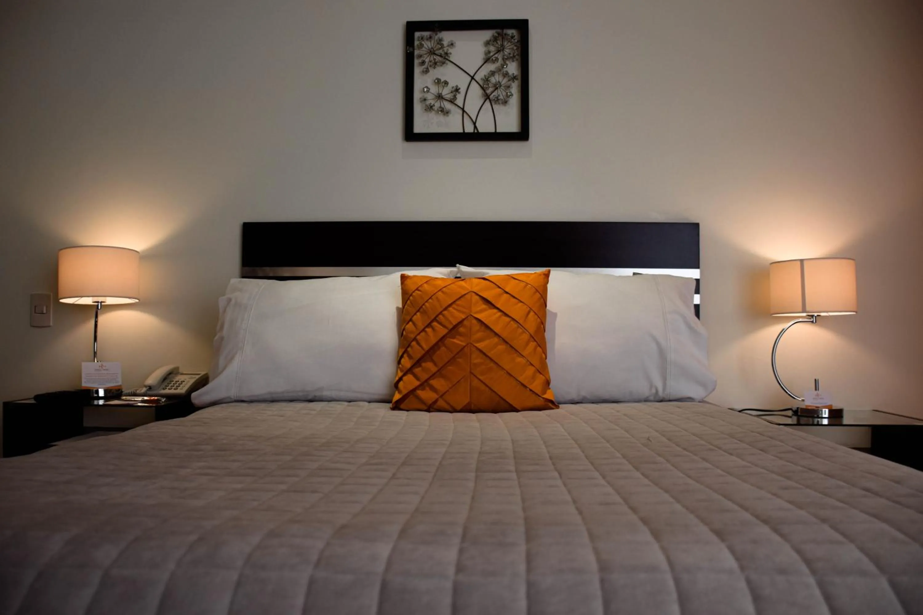 Bed in Hotel NC La Paz