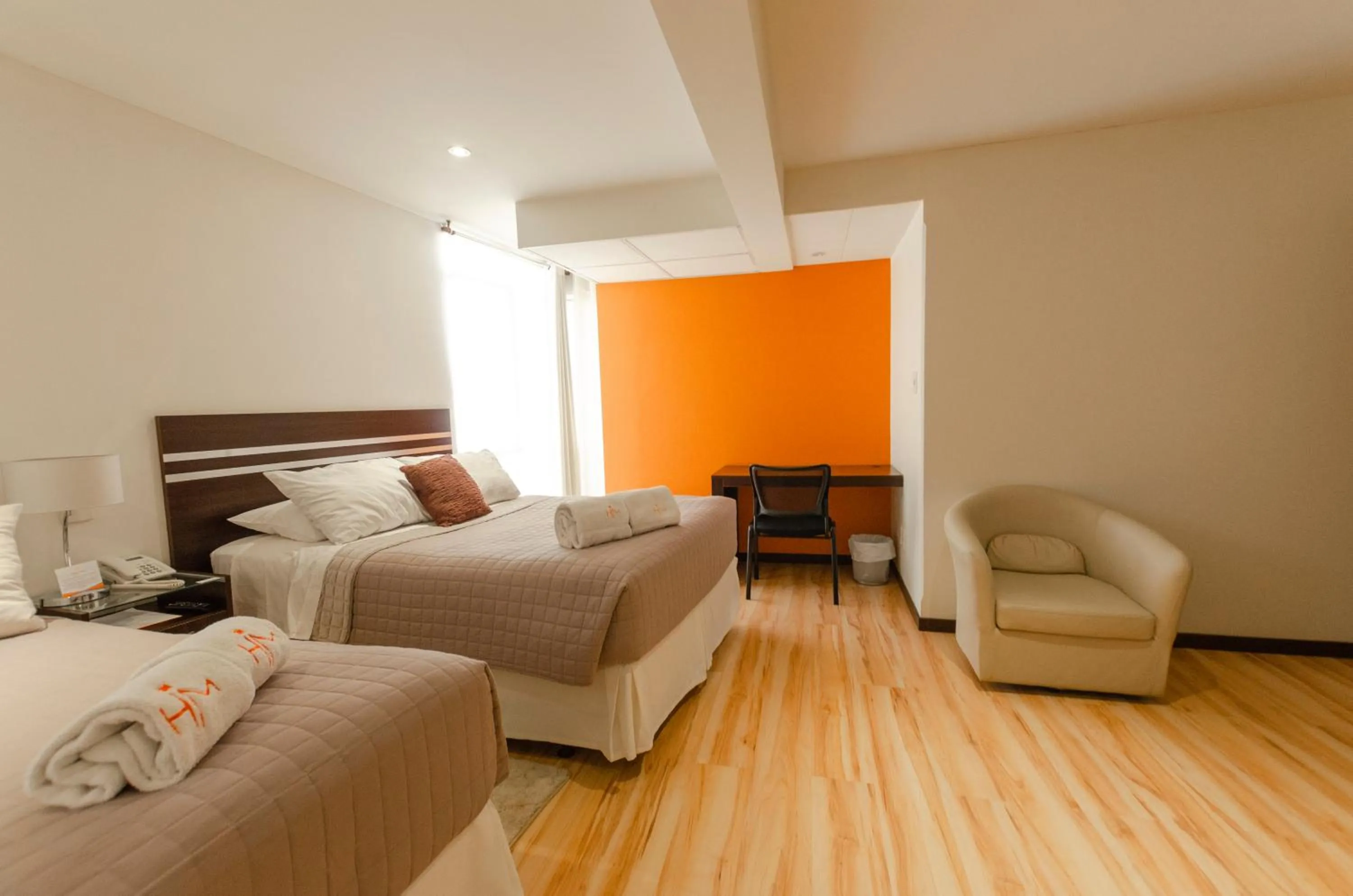 Bed in Hotel NC La Paz