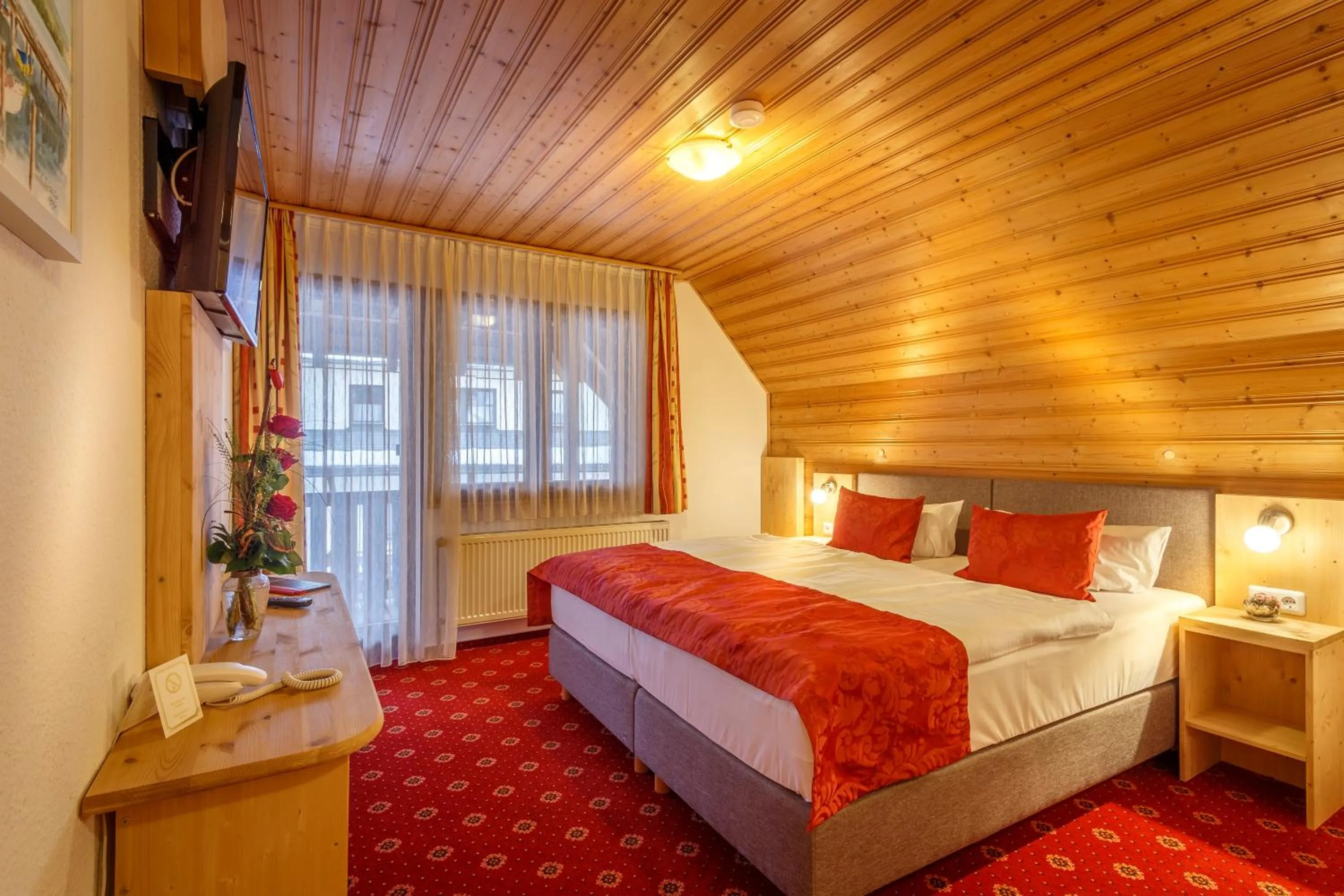 Photo of the whole room, Bed in Landhotel Bartlehof