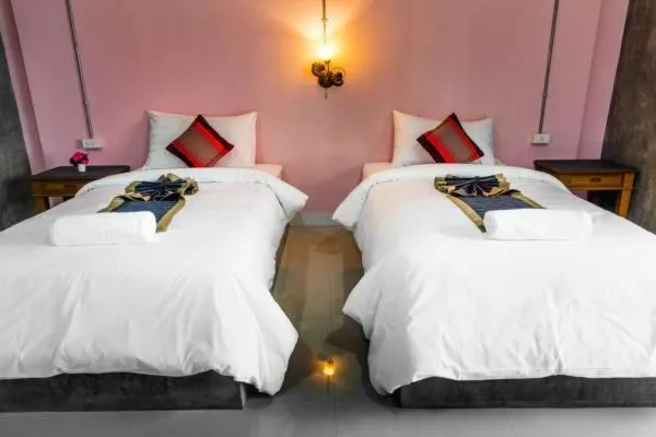Bed in The Guest Hotel Krabi