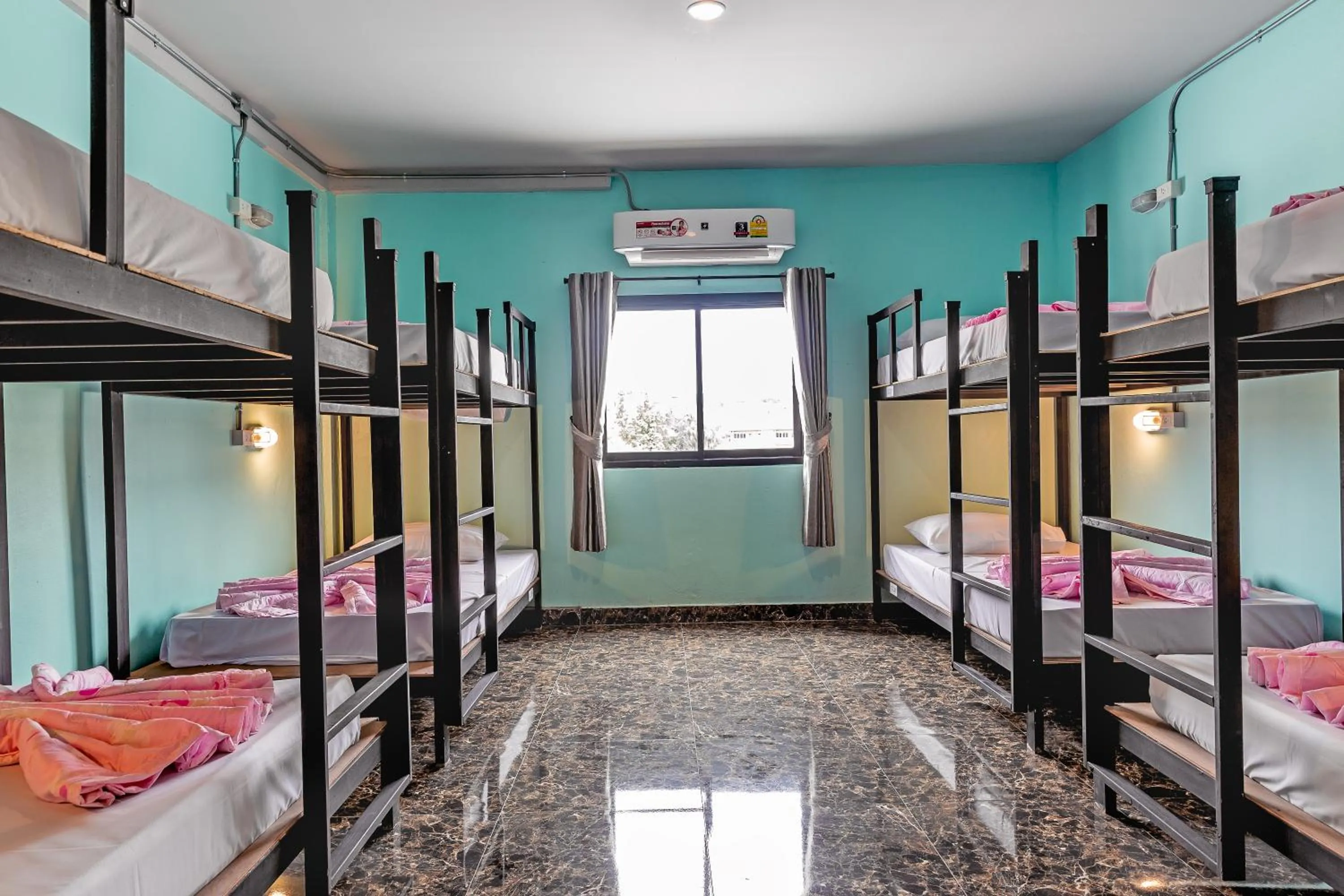 Bed in The Guest Hotel Krabi