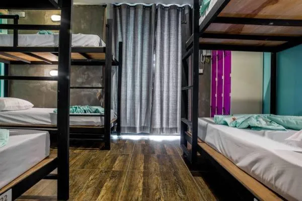 Bed in The Guest Hotel Krabi