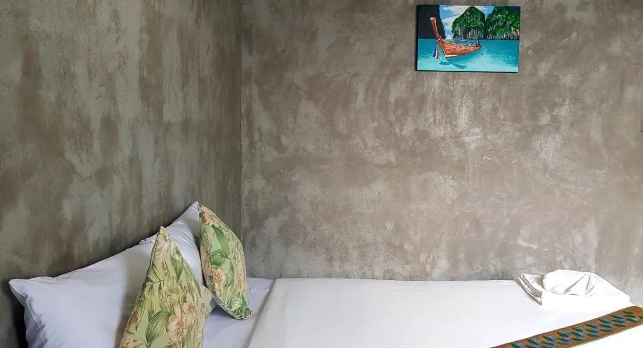 Bed in The Guest Hotel Krabi