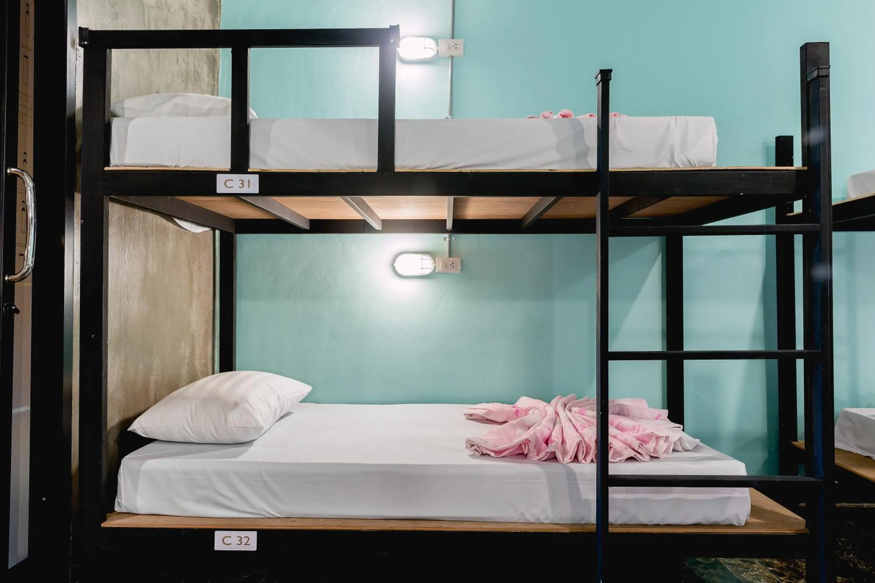 Bed in The Guest Hotel Krabi