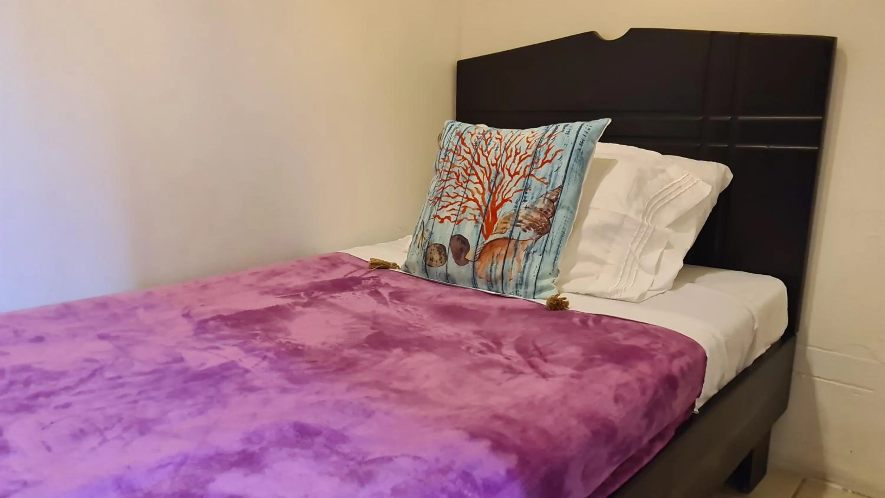 Bed in El Encanto Condominiums