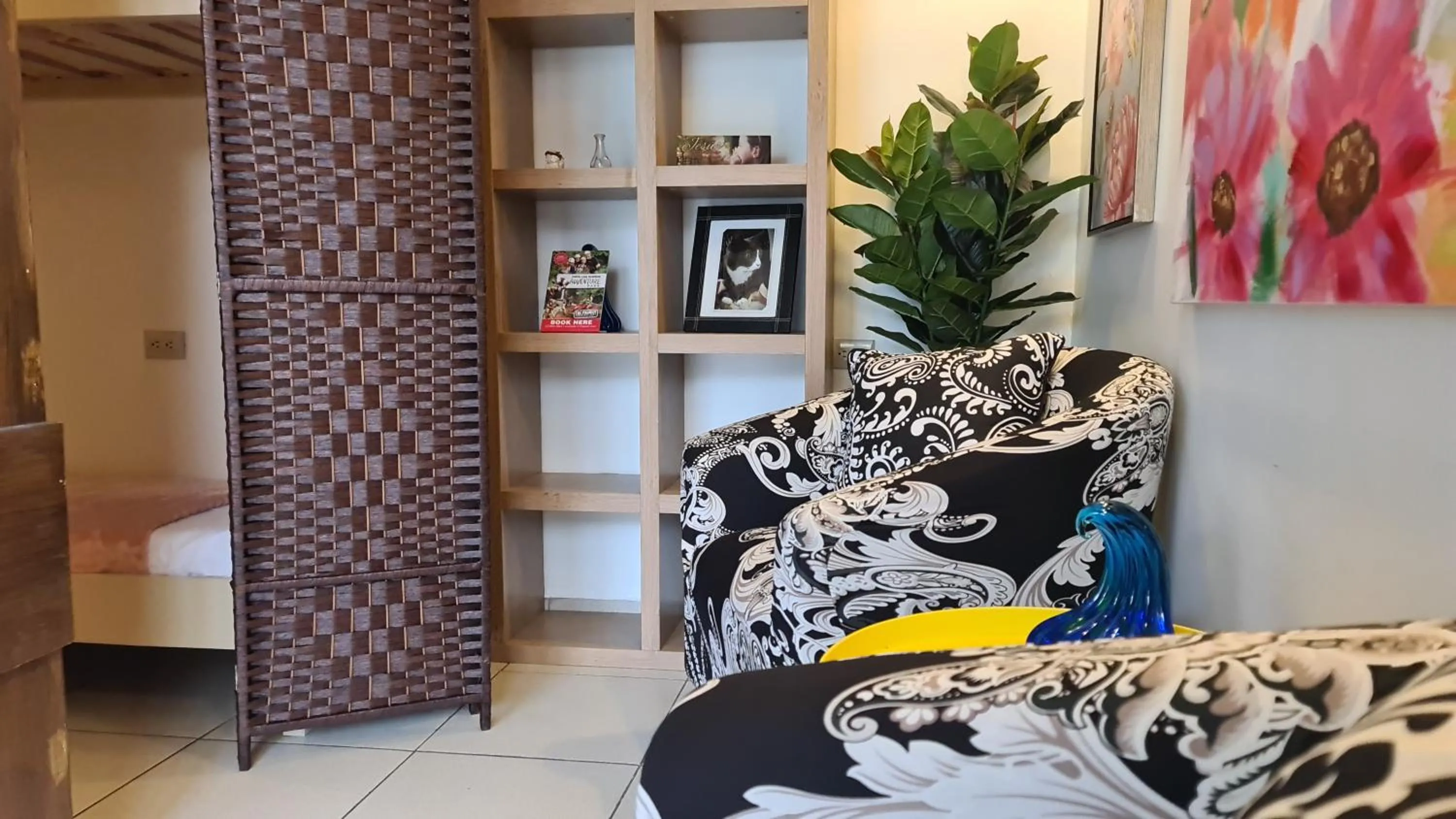 Seating area, Bed in El Encanto Condominiums