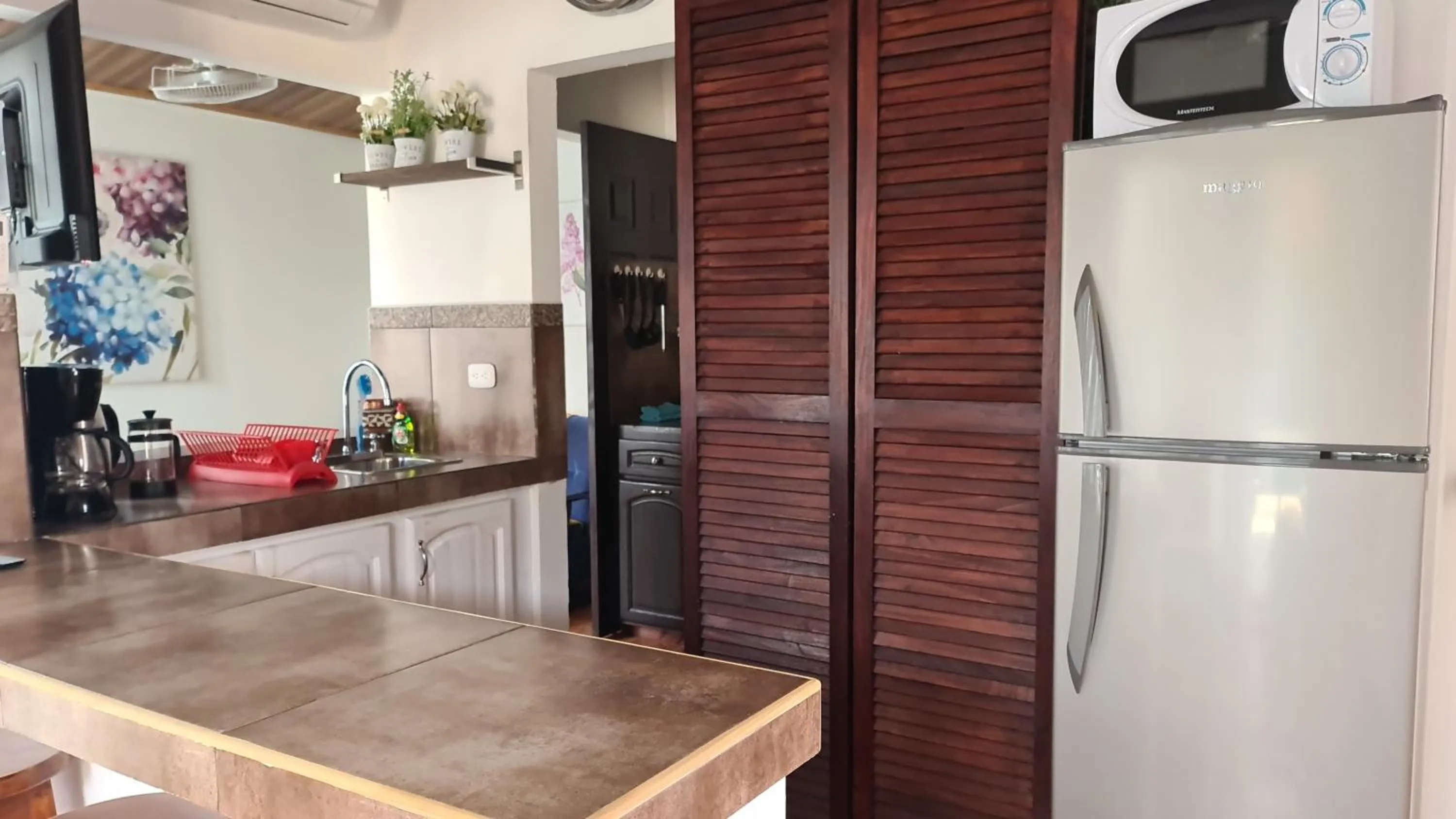 Kitchen or kitchenette in El Encanto Condominiums