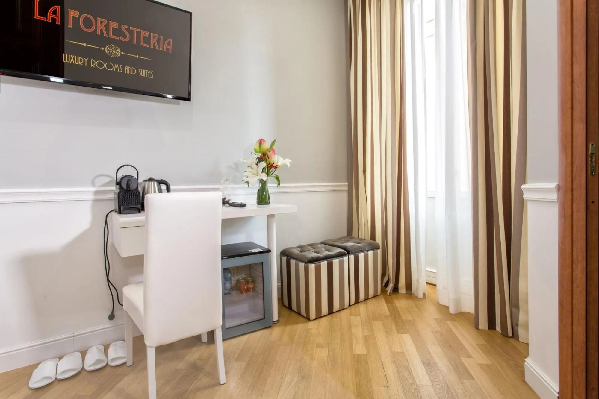 Photo of the whole room in La Foresteria Luxury Suites