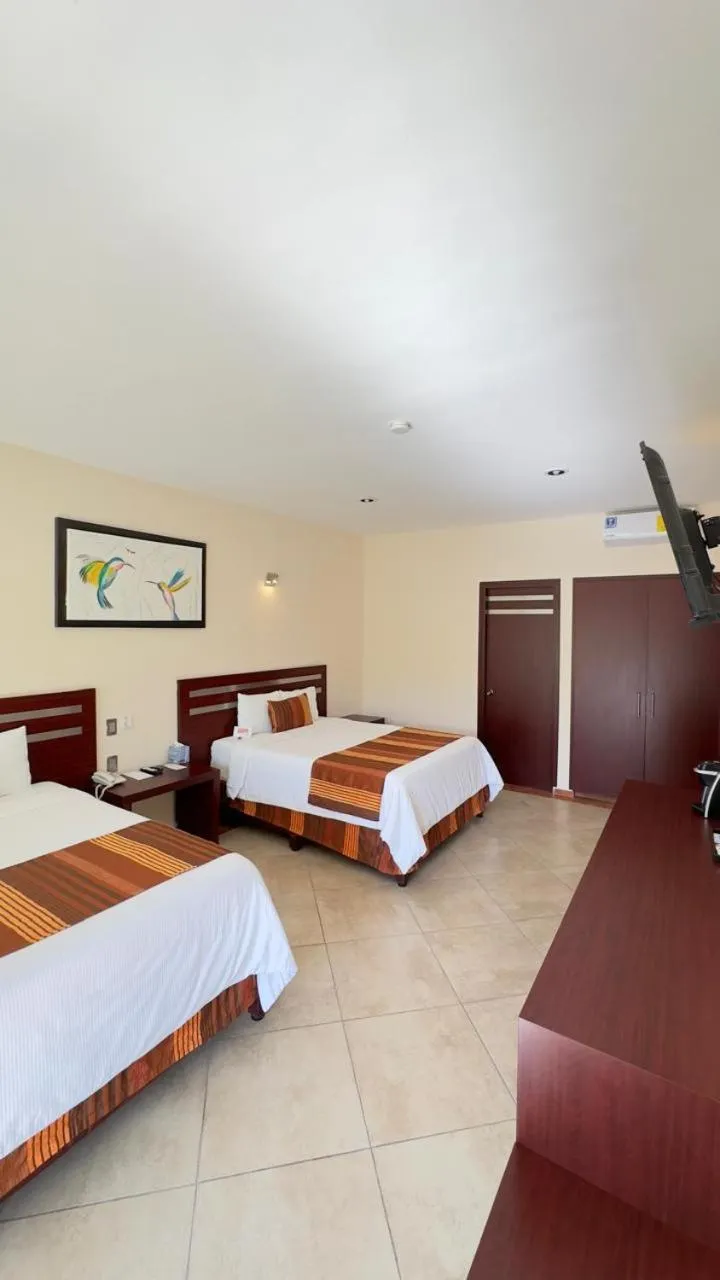 Bed in Hotel Quinta Tequisquiapan