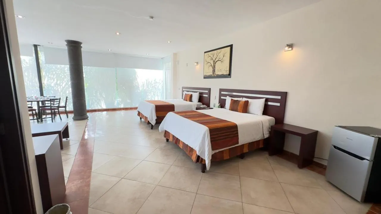 Bed in Hotel Quinta Tequisquiapan