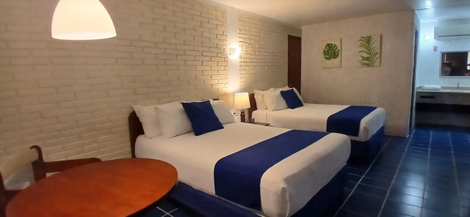 Bed in Hotel Plaza Palmas