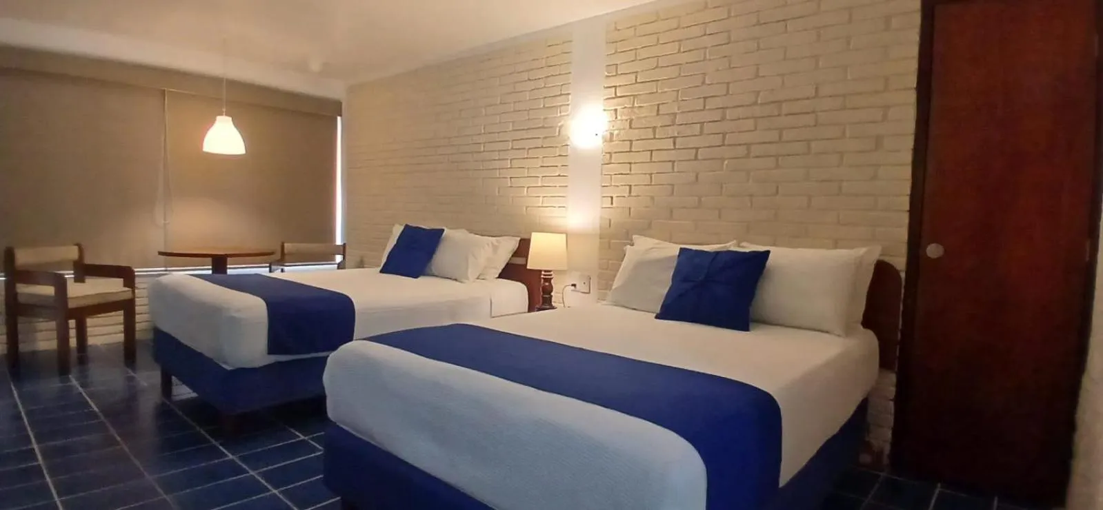 Bed in Hotel Plaza Palmas