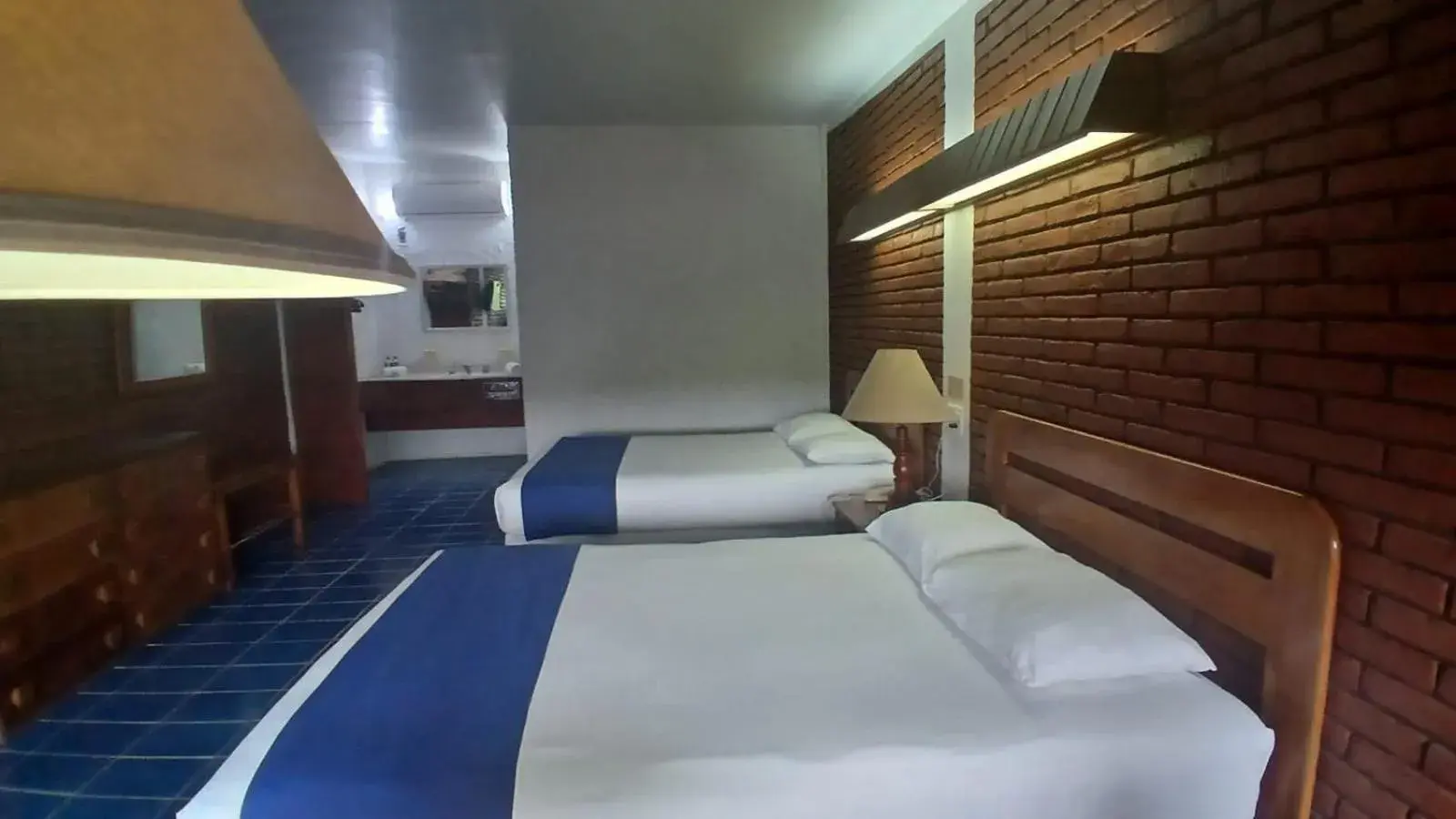 Double Room with Two Double Beds in Hotel Plaza Palmas Double Room with Two Double Beds in Hotel Plaza Palmas