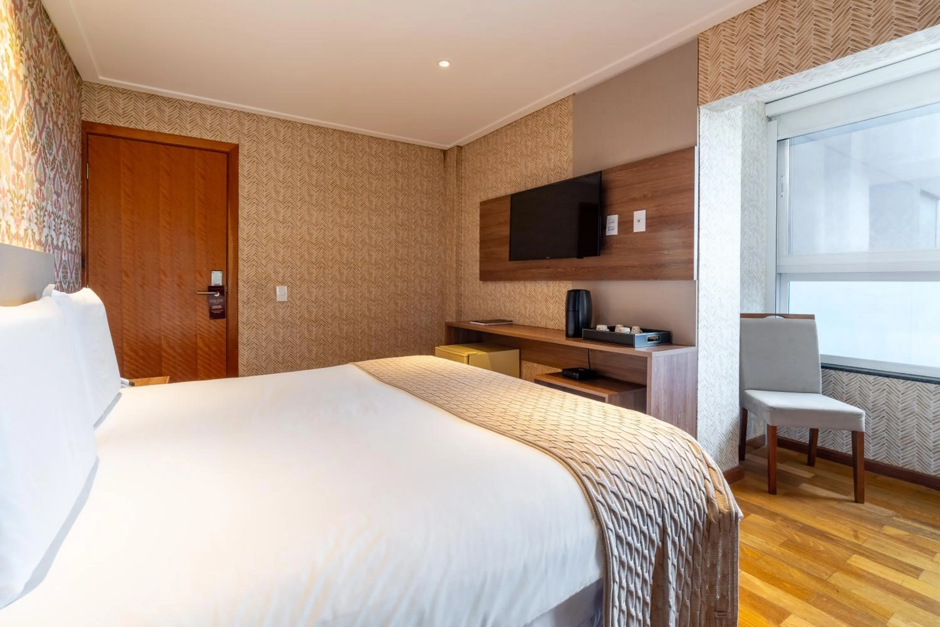 Bed in Chris Wellness Resort Hotel