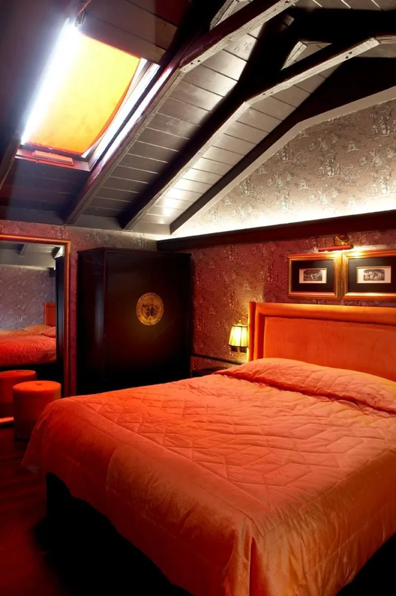 Bed in Maison Grecque Hotel Extraordinaire