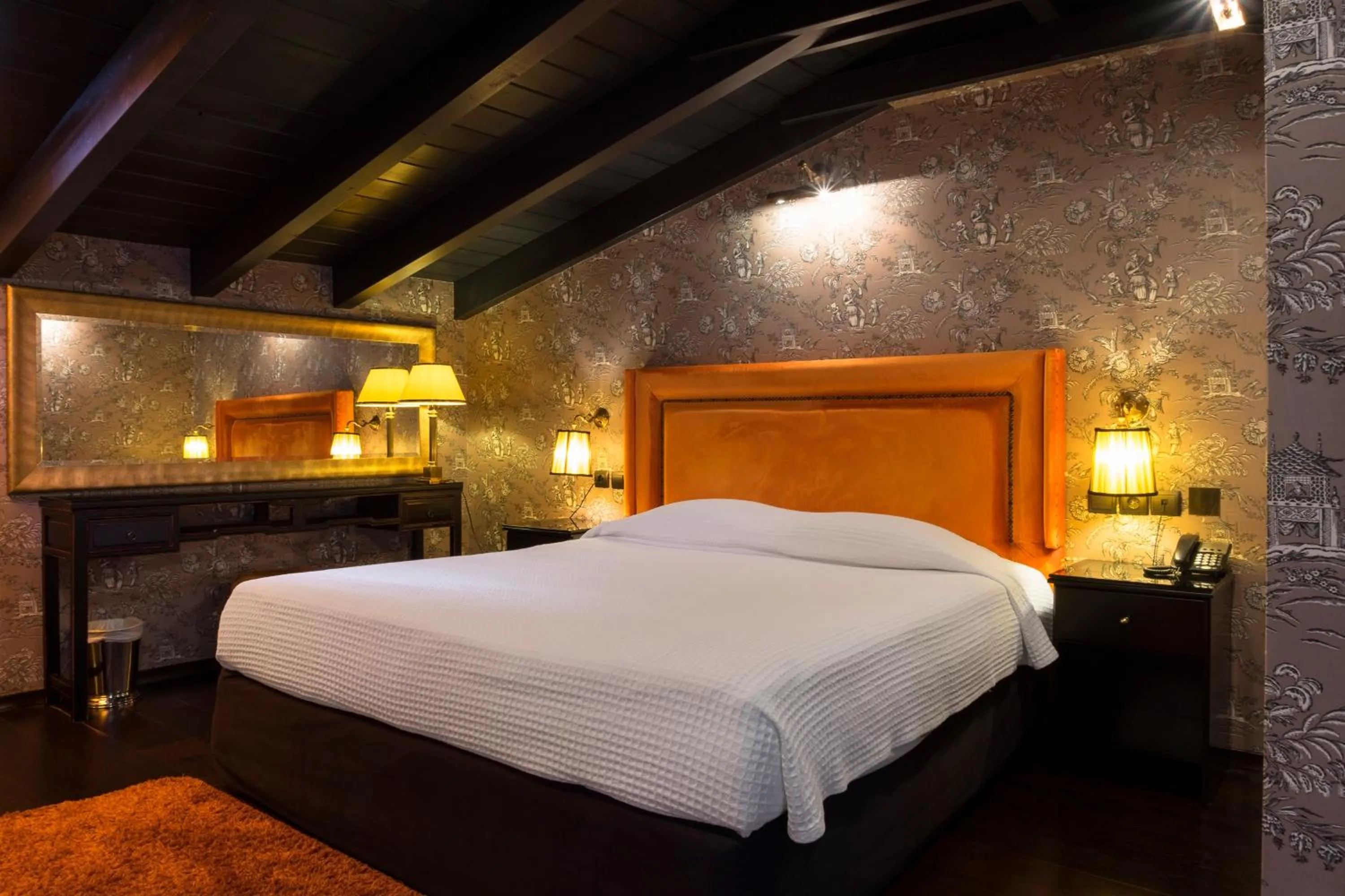 Bed in Maison Grecque Hotel Extraordinaire