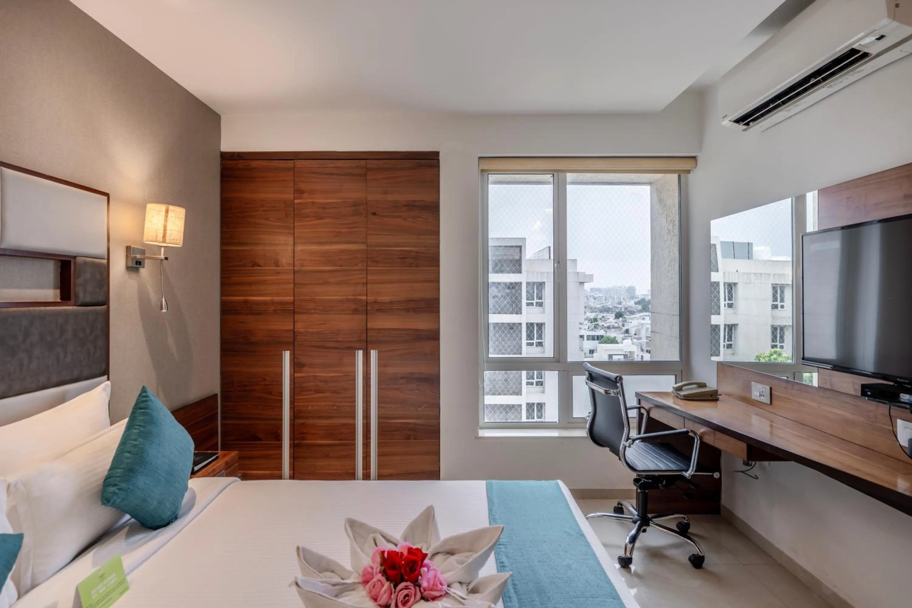 Bedroom, Bed in Quality Inn Patria Suites, Rajkot