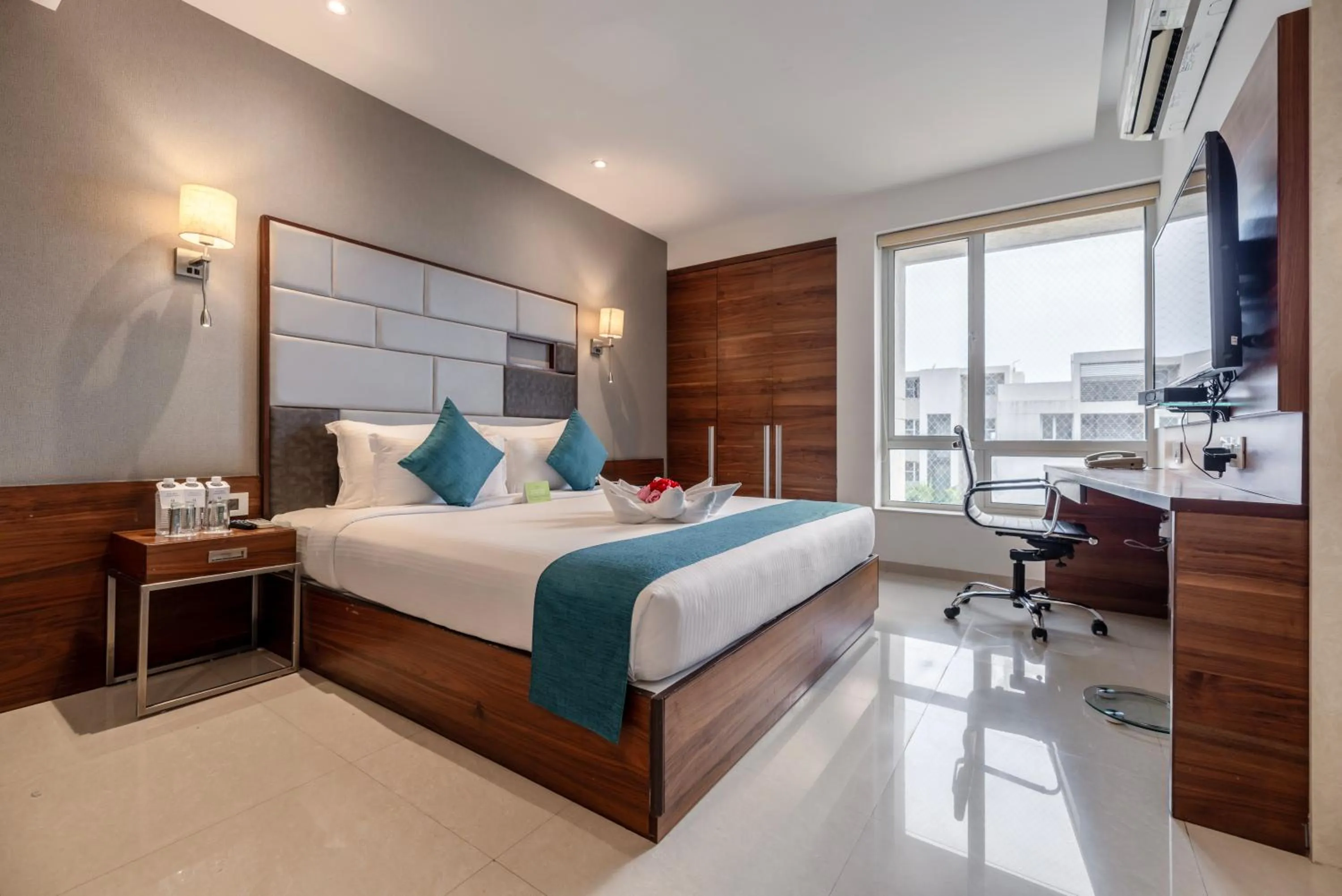 Photo of the whole room, Bed in Quality Inn Patria Suites, Rajkot