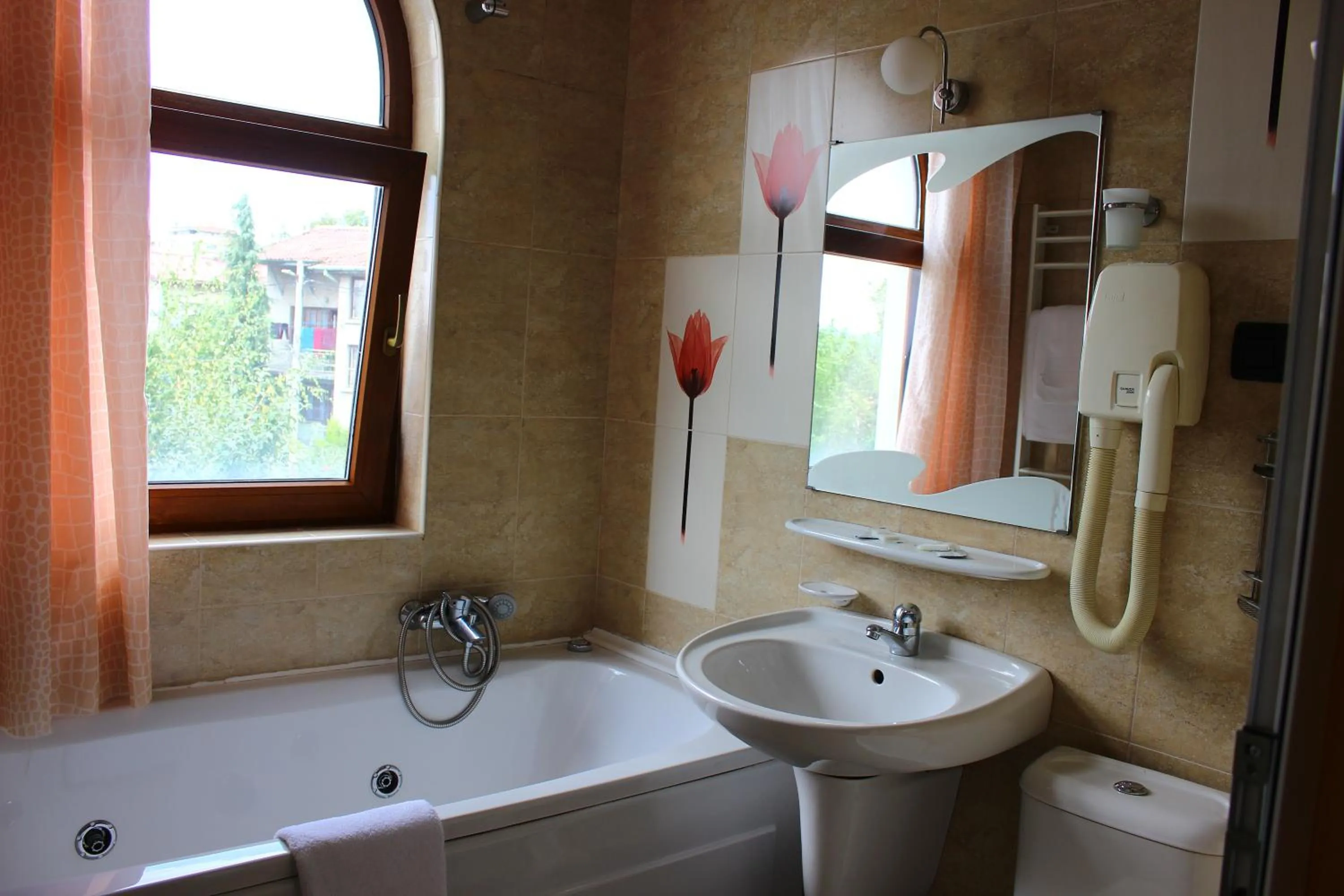 Bathroom in Family Hotel Sonata