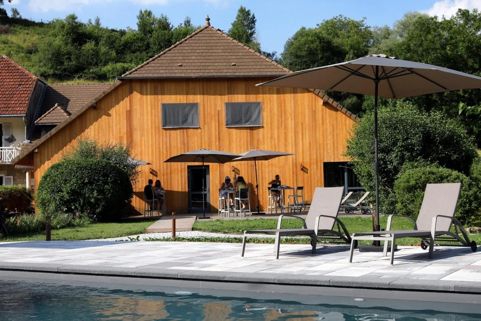 Swimming pool in Maison d'hôtes & SPA La Scierie