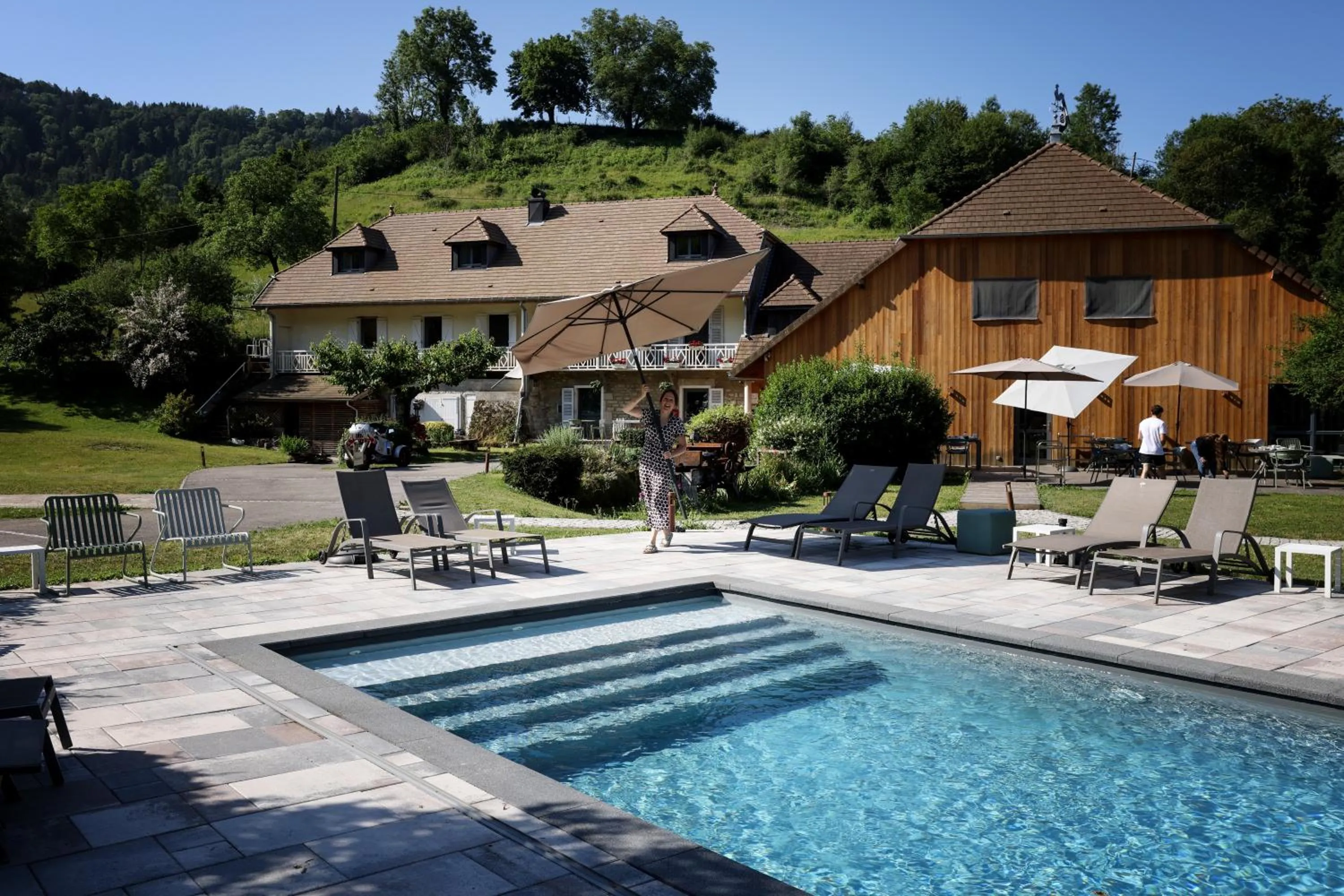 Swimming pool in Maison d'hôtes & SPA La Scierie
