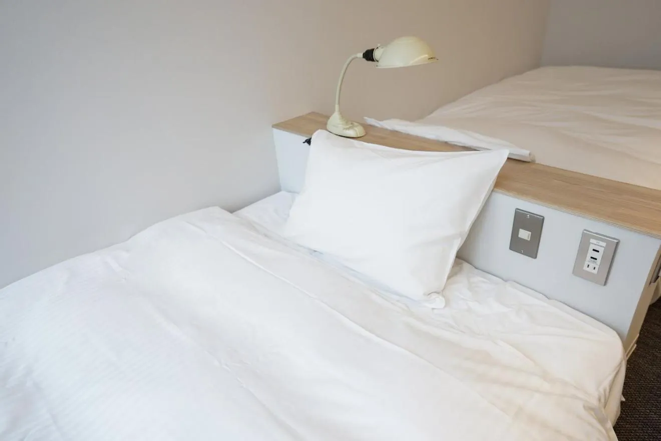 Bed in Hotel Potmum Sapporo