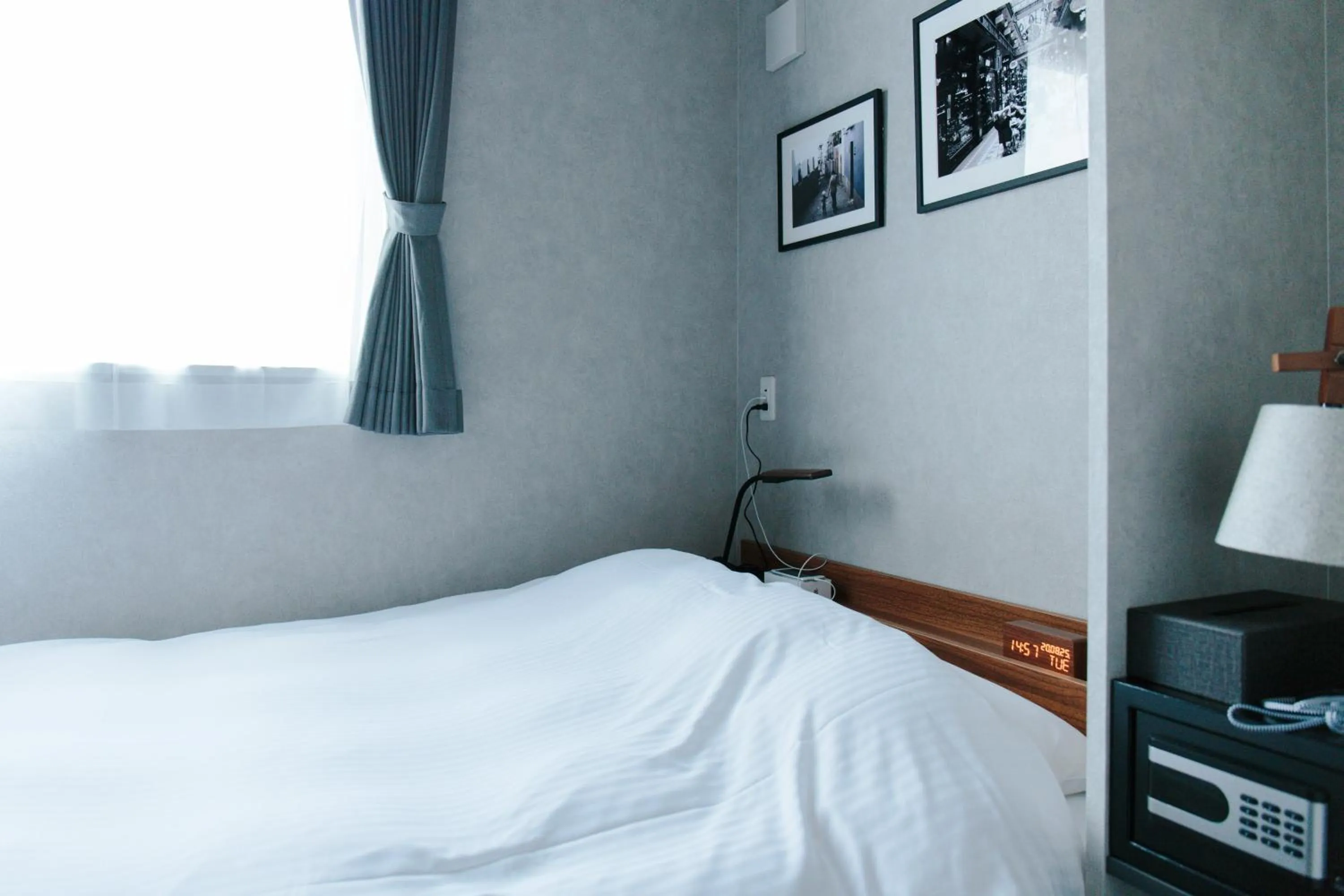 Bed in Hotel Potmum Sapporo