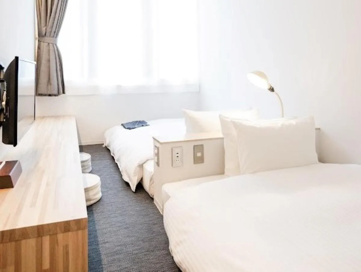 Bed in Hotel Potmum Sapporo